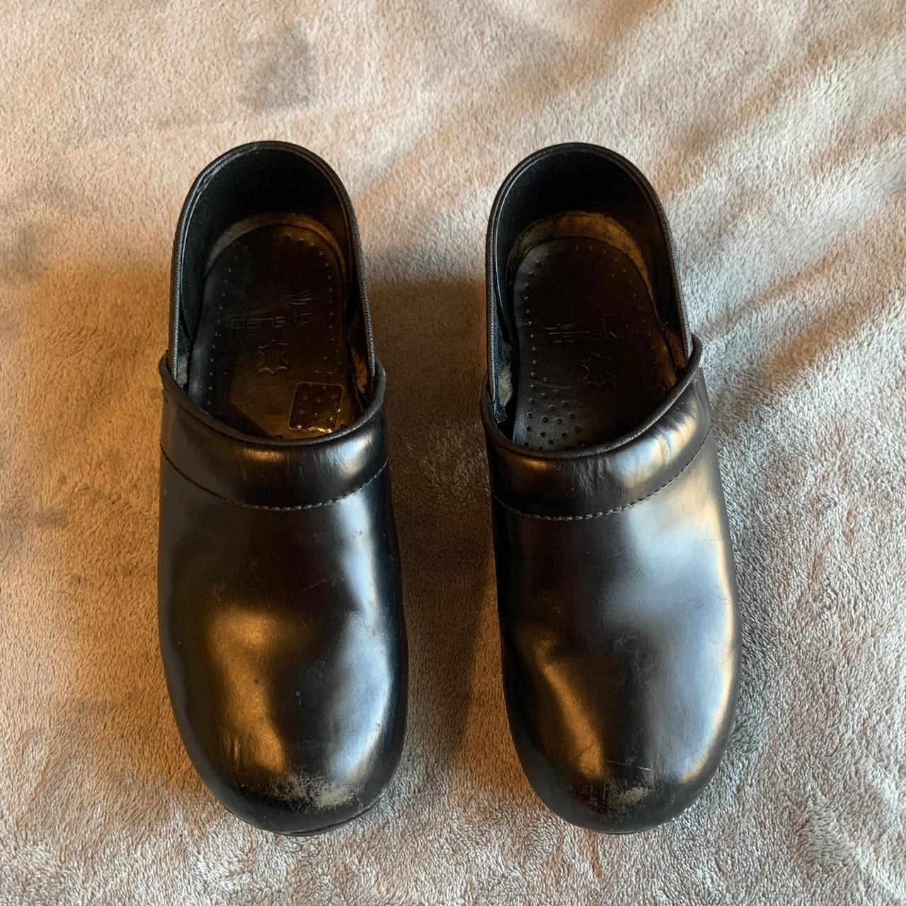 Dansko Women's Black Clogs | Depop