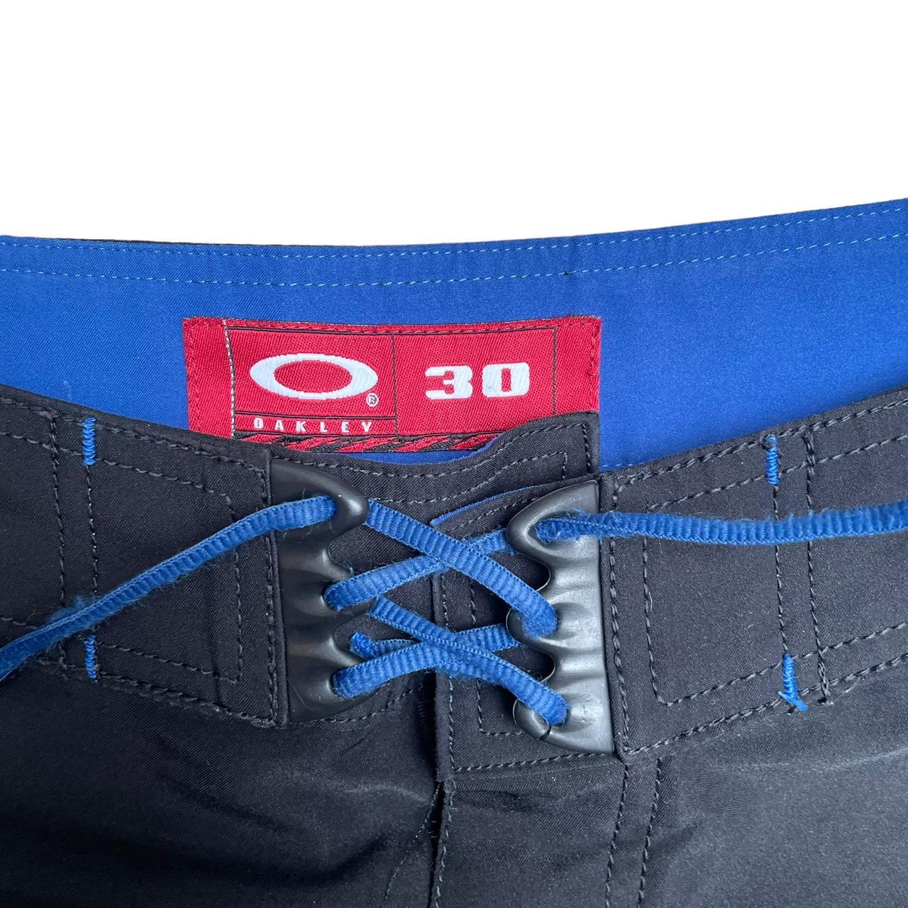 Oakley Men's Black and Blue Shorts Depop