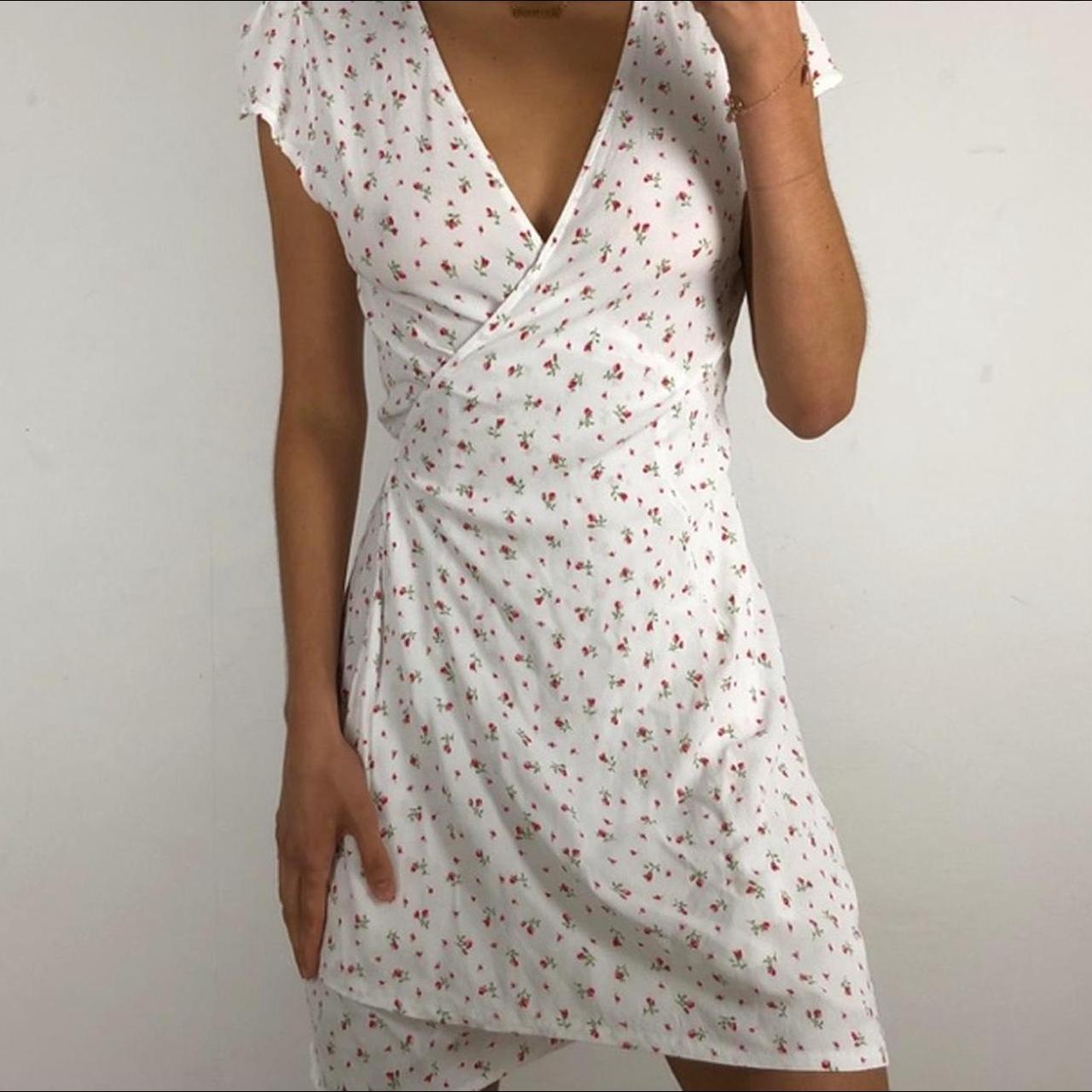 Brandy Melville floral wrap dress so cute and... Depop
