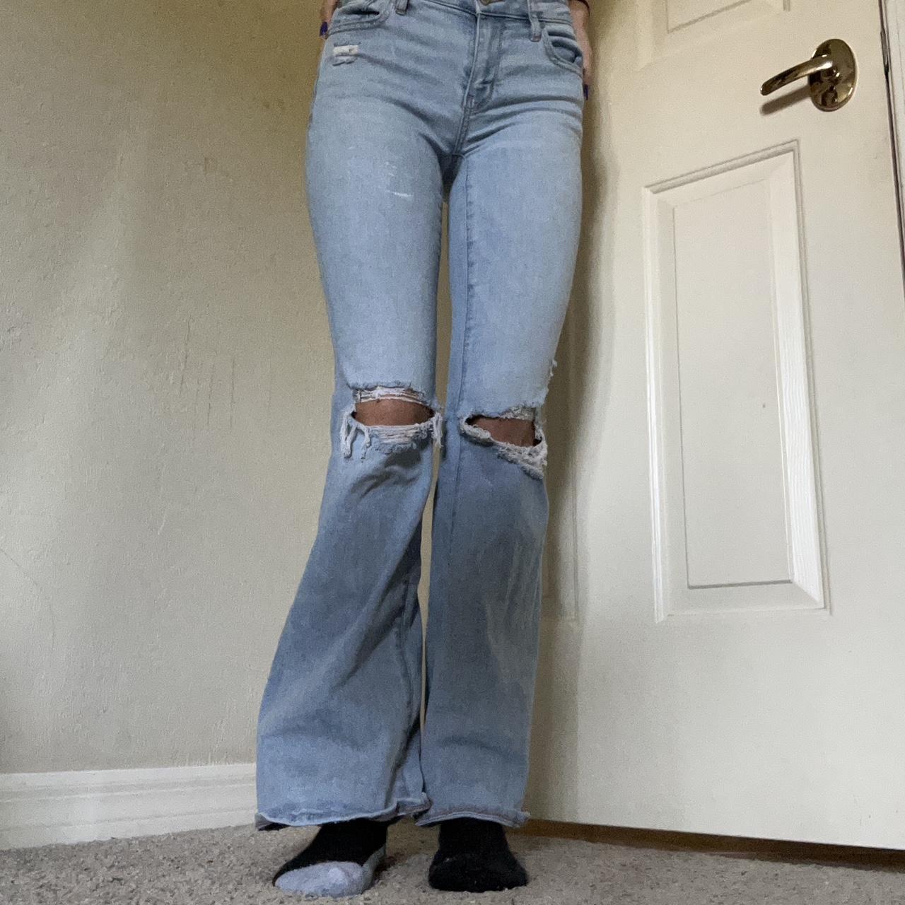 Light wash American eagle boot cut jeans size 000... Depop