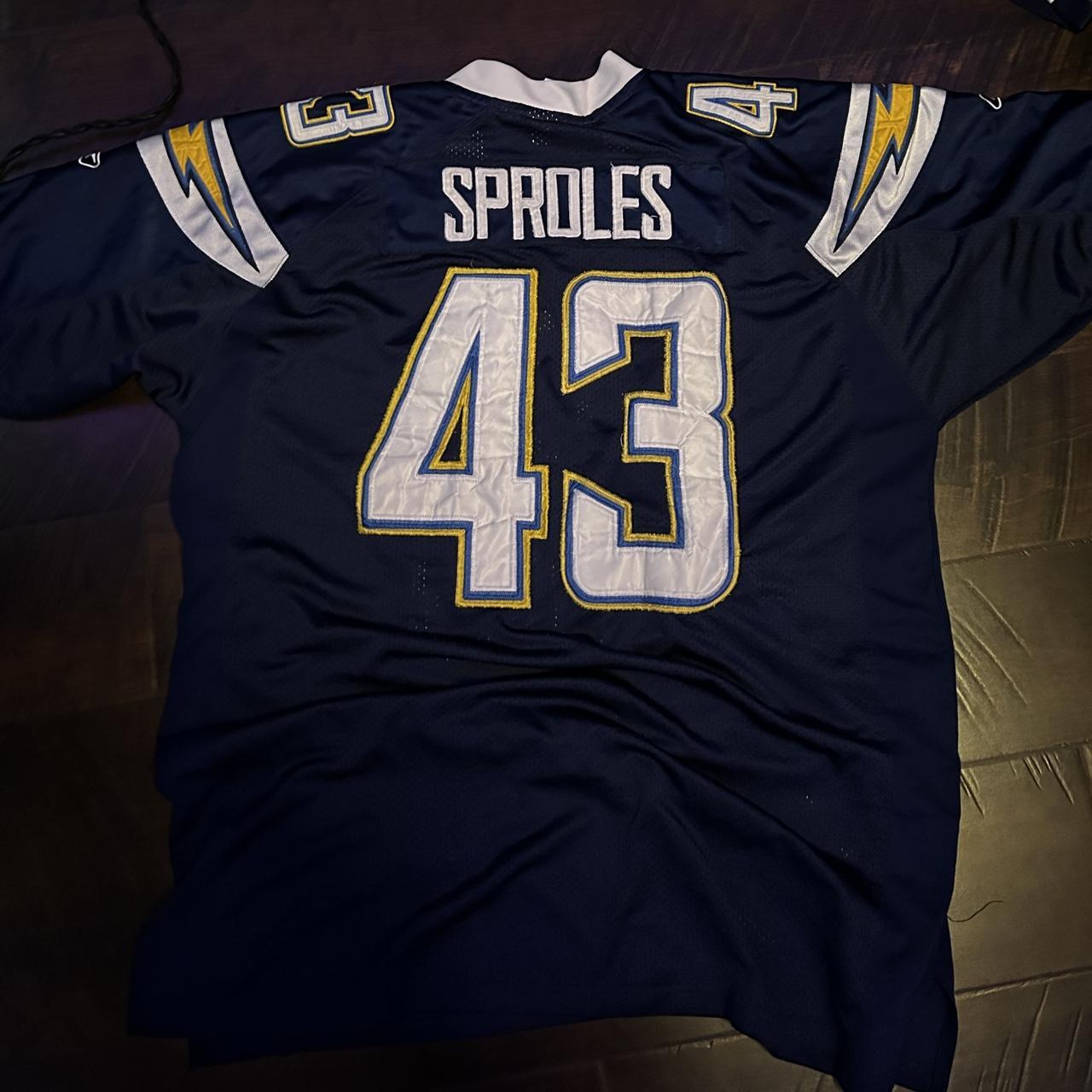 Vintage Chargers jersey tag says size 54 Reebok. Depop