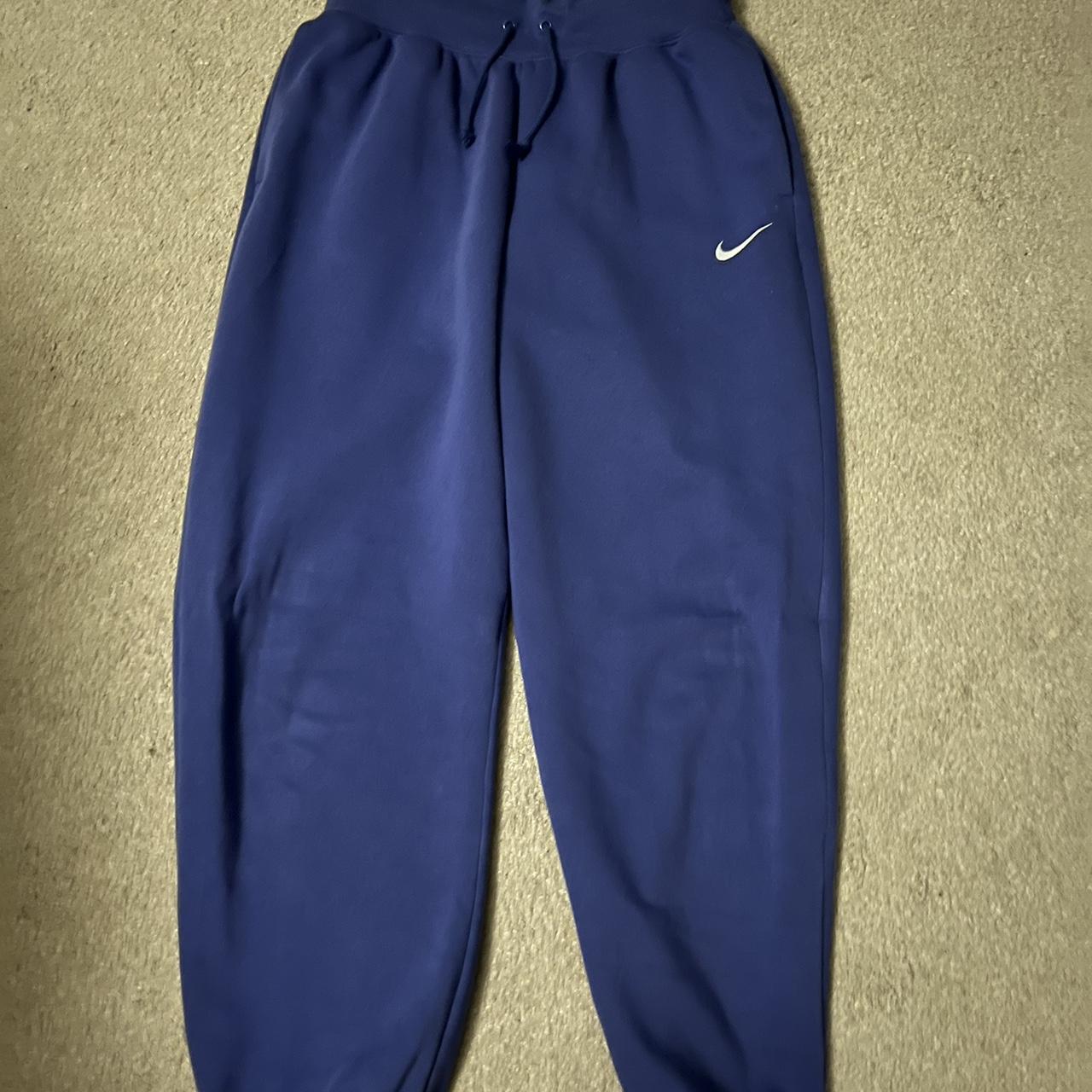 Dark blue/purplish coloured Nike joggers oversized... Depop