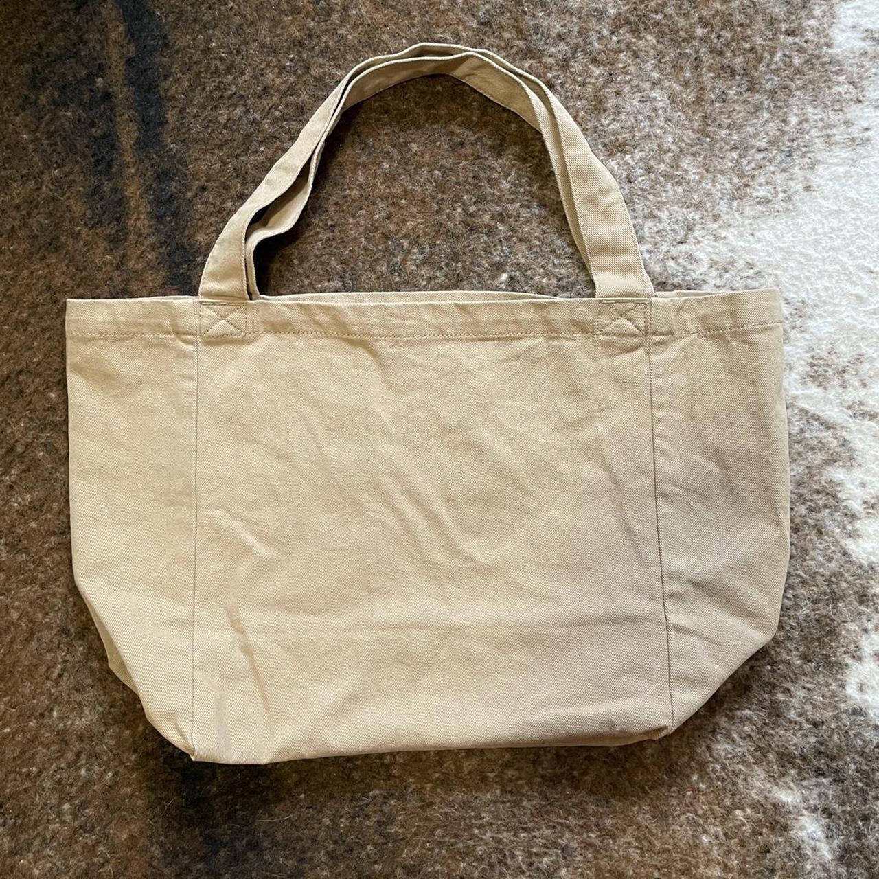 Tan brandy melville tote bag has 4 snap... - Depop