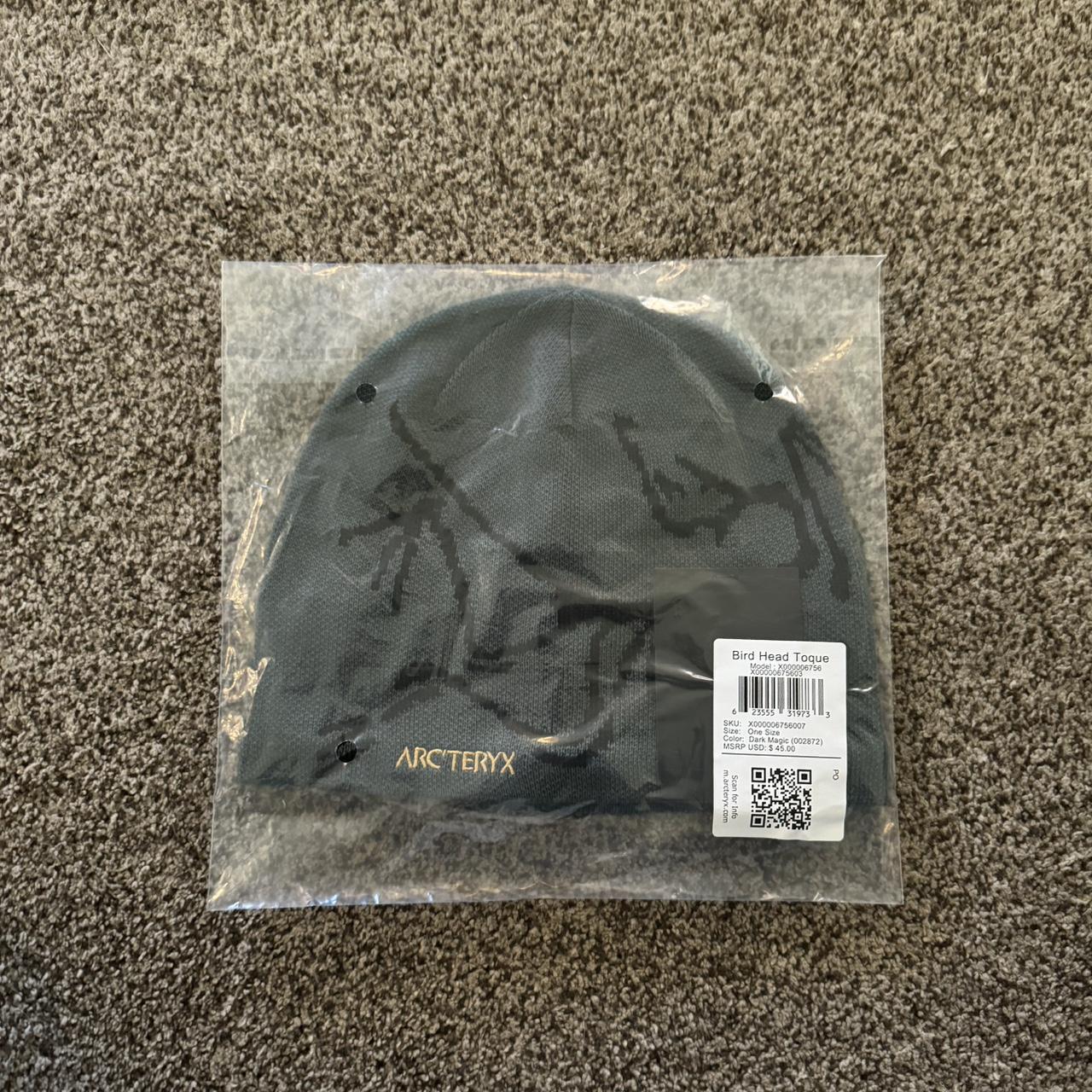 Arcteryx beanie like a dark pine green black... - Depop