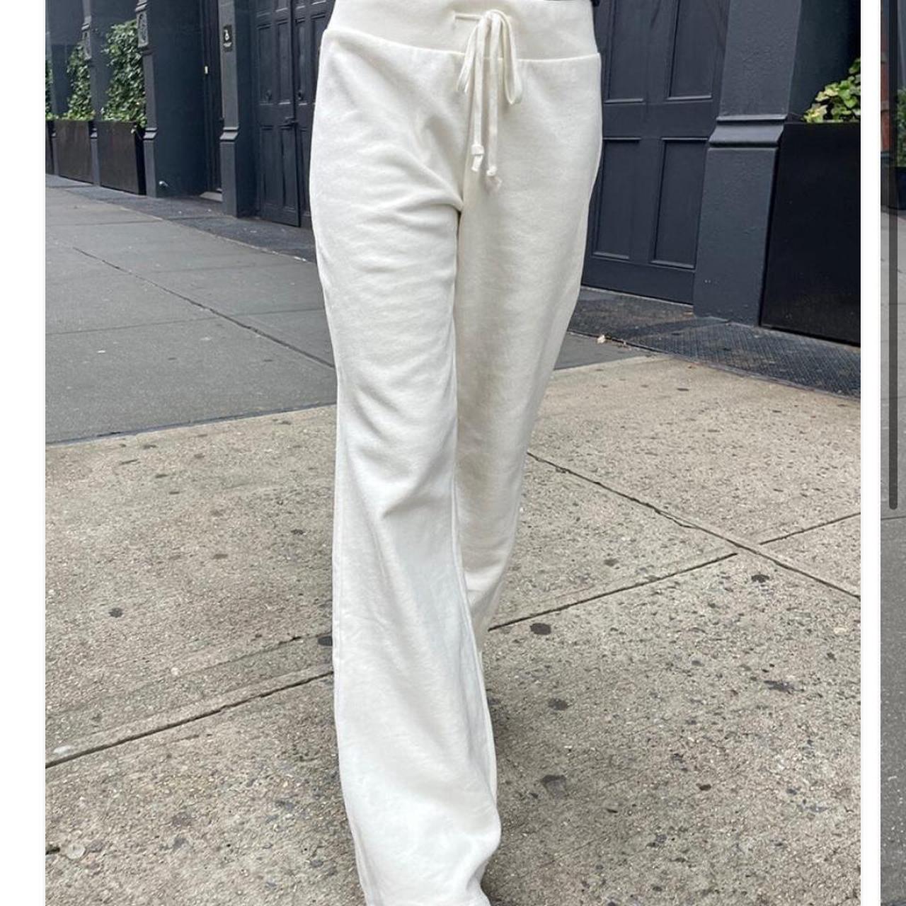 Brandy Melville “hillary soft yoga pants” in white,... Depop