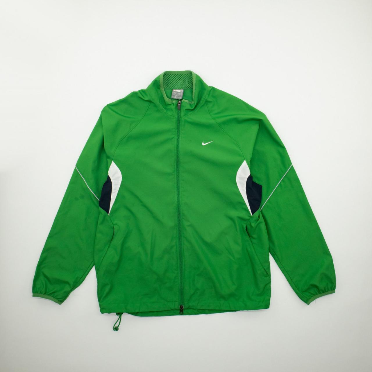 Nike Y2K Windbreaker Jacket. There are some black... Depop