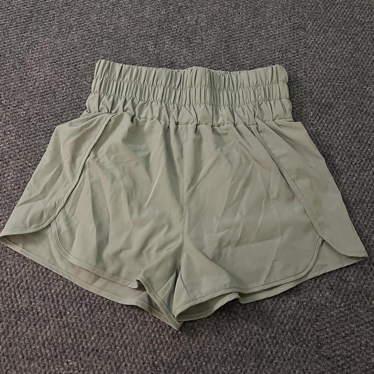 high waisted green shorts! size LG and brand is New... Depop