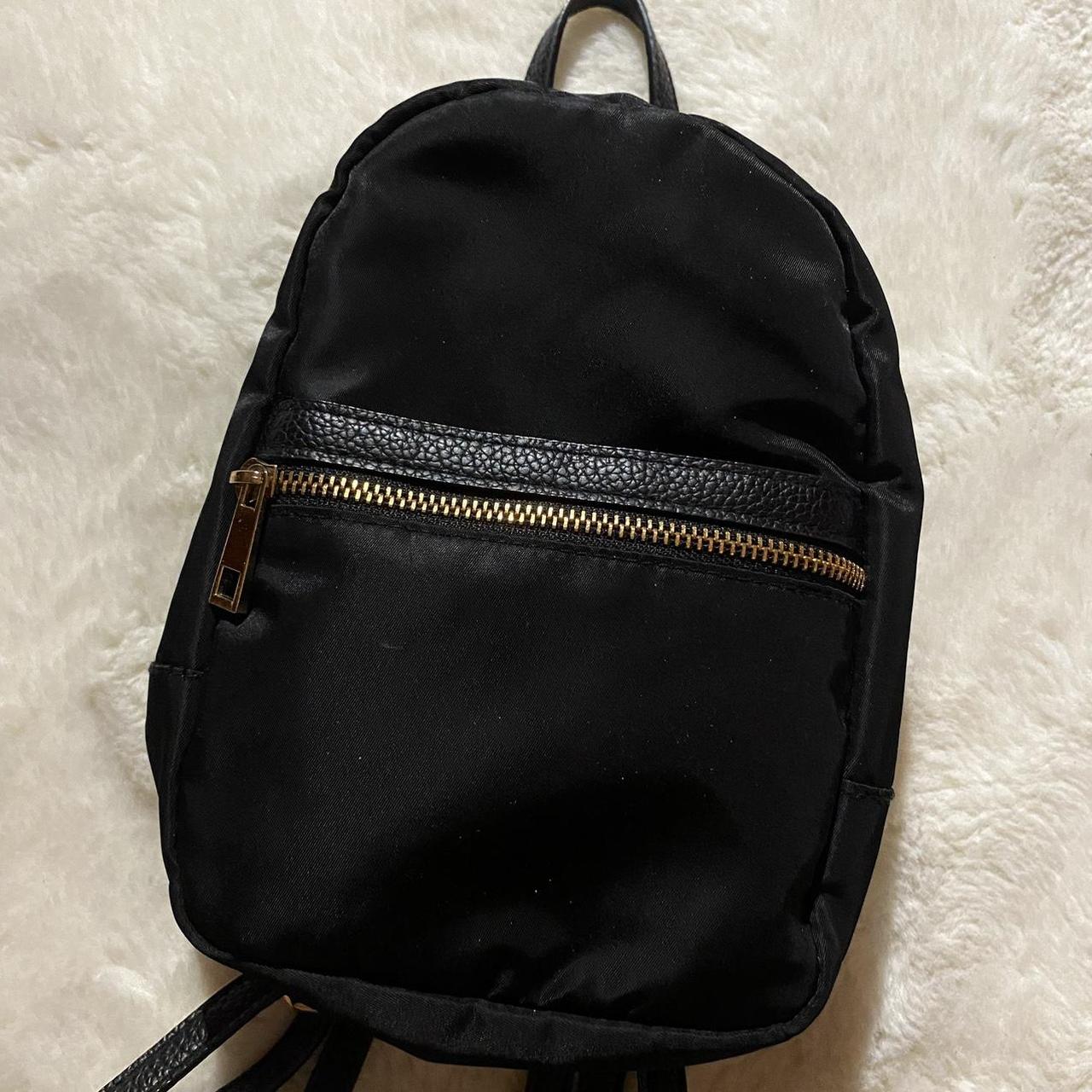 A new day backpack on sale purse