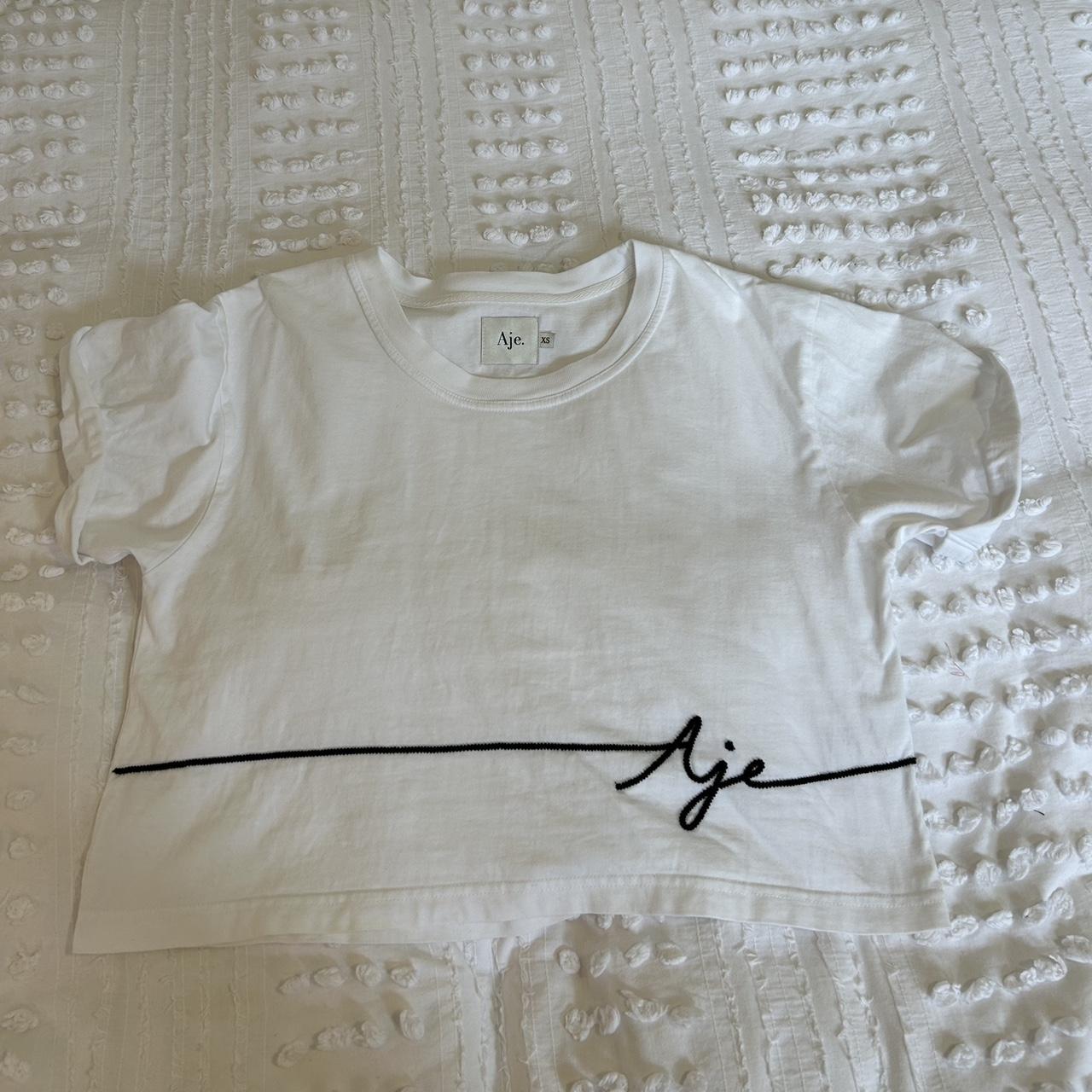 Aje Women's White and Black T-shirt | Depop