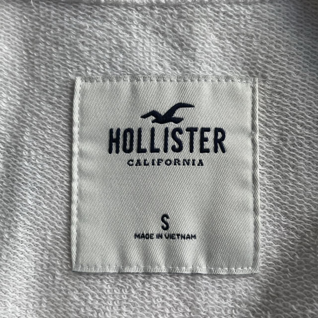 White Jumper with Tie Detail at Front Hollister Size... - Depop