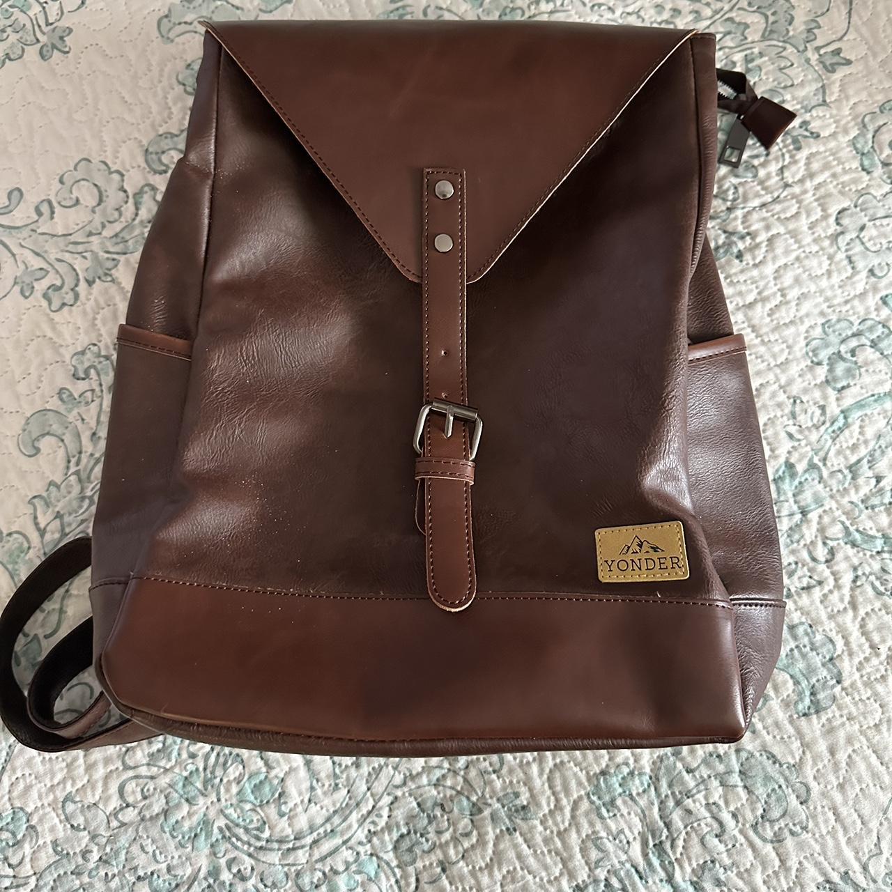 Vintage dark brown leather backpack Has buttons on... - Depop