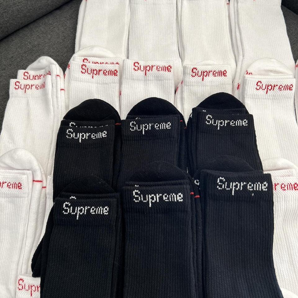 Supreme white and red socks and supreme black