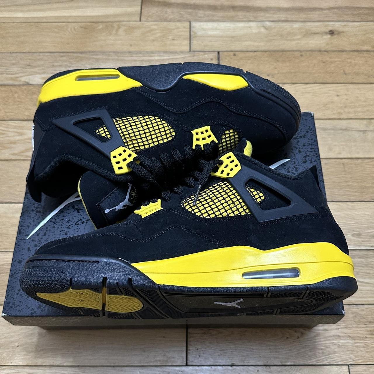 Nike Air Jordan 4 Retro Thunder Black/White Tour... - Depop