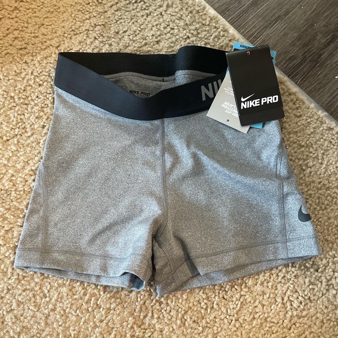 Nike Pros , -new with tags, -XS, -grey, -only tried on...