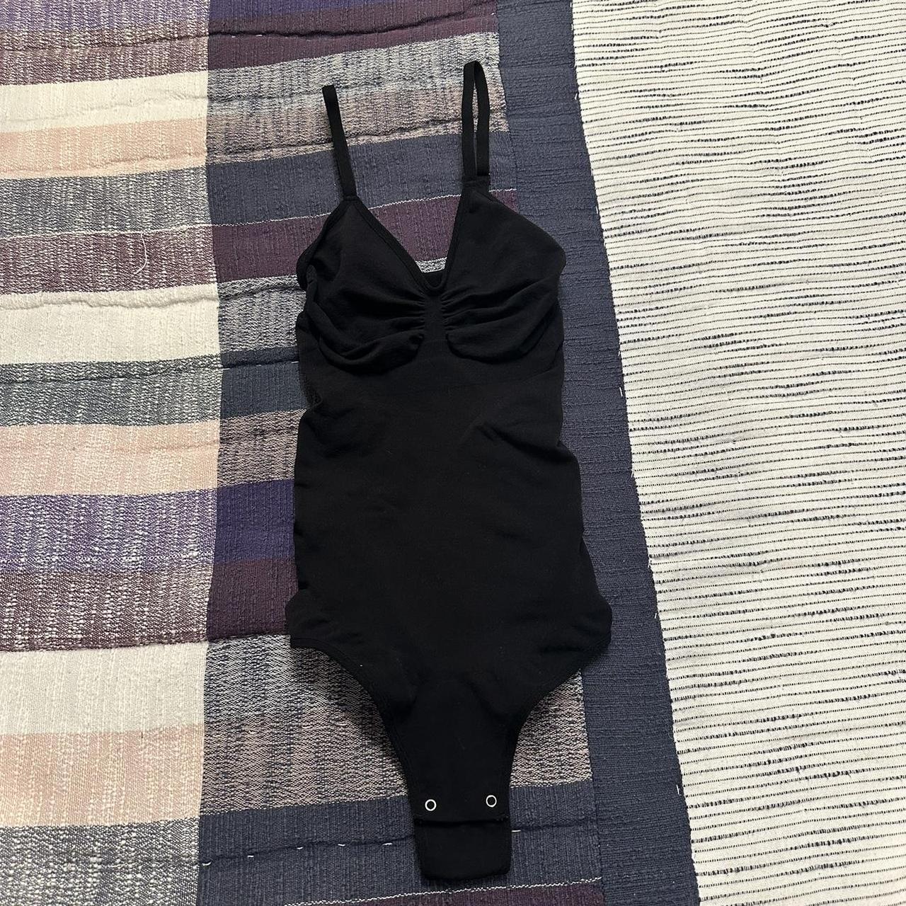 Sculpting black bodysuit purchased from