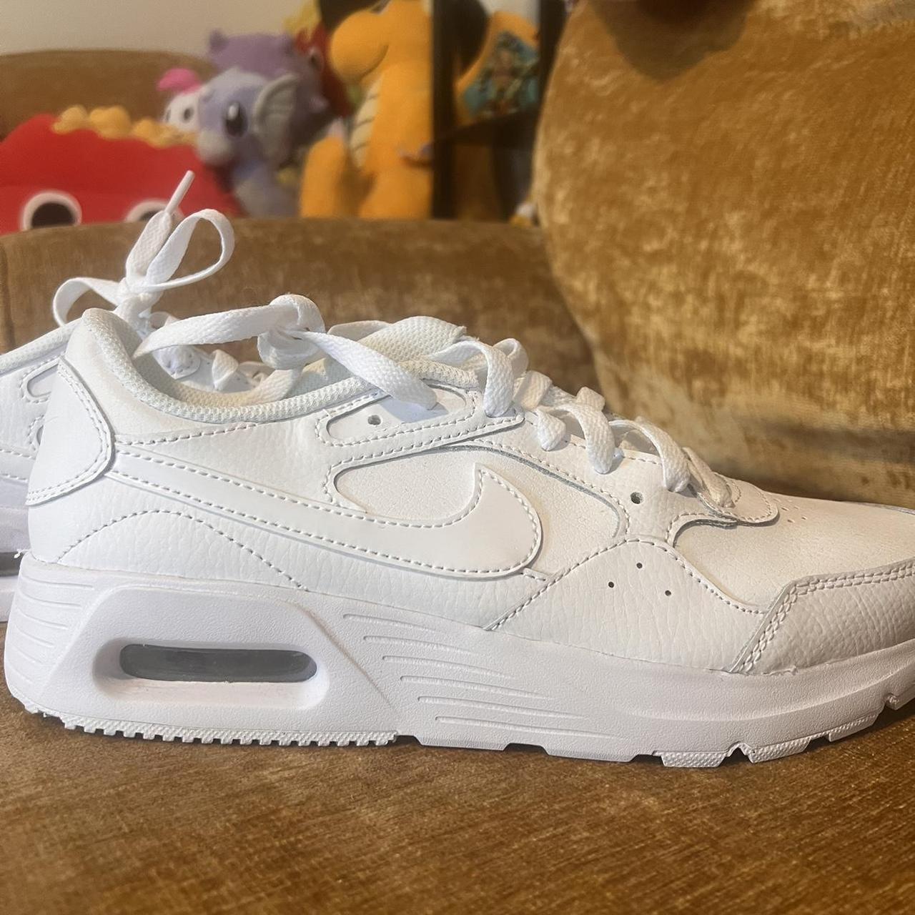 Triple clearance white trainers