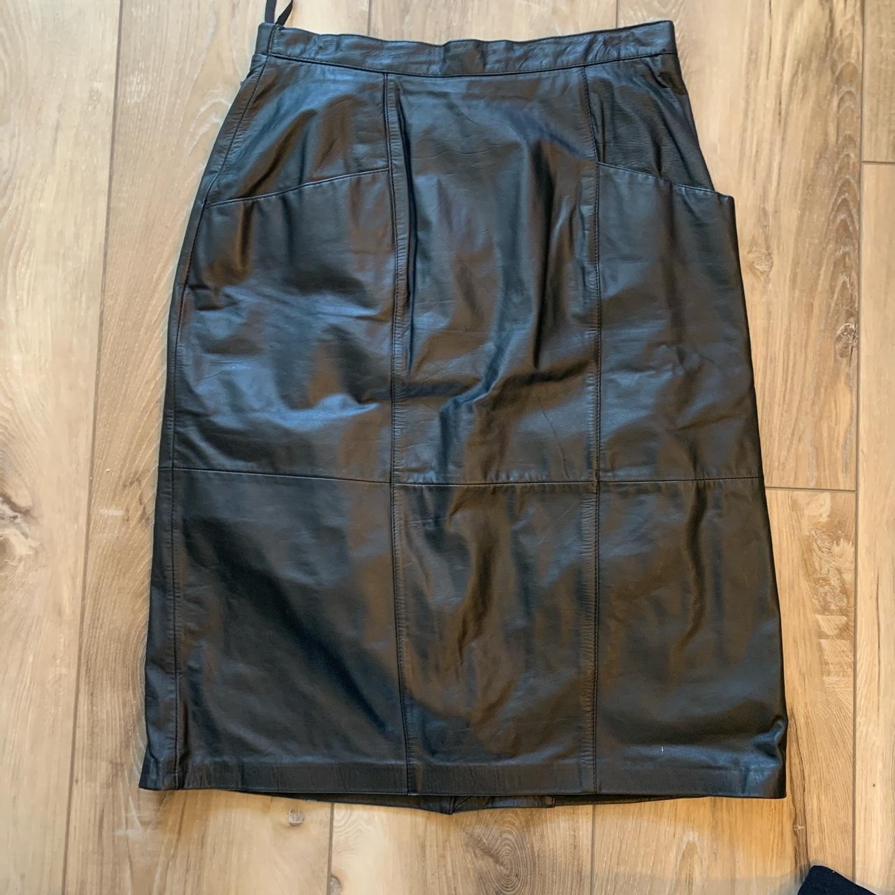 Black leather skirt Real leather Elastic on back... - Depop