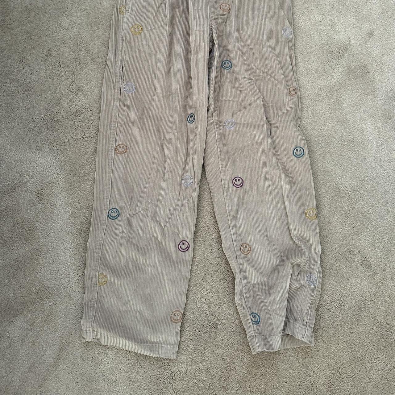 Corduroy tan smiley face pants from urban outfitters - Depop