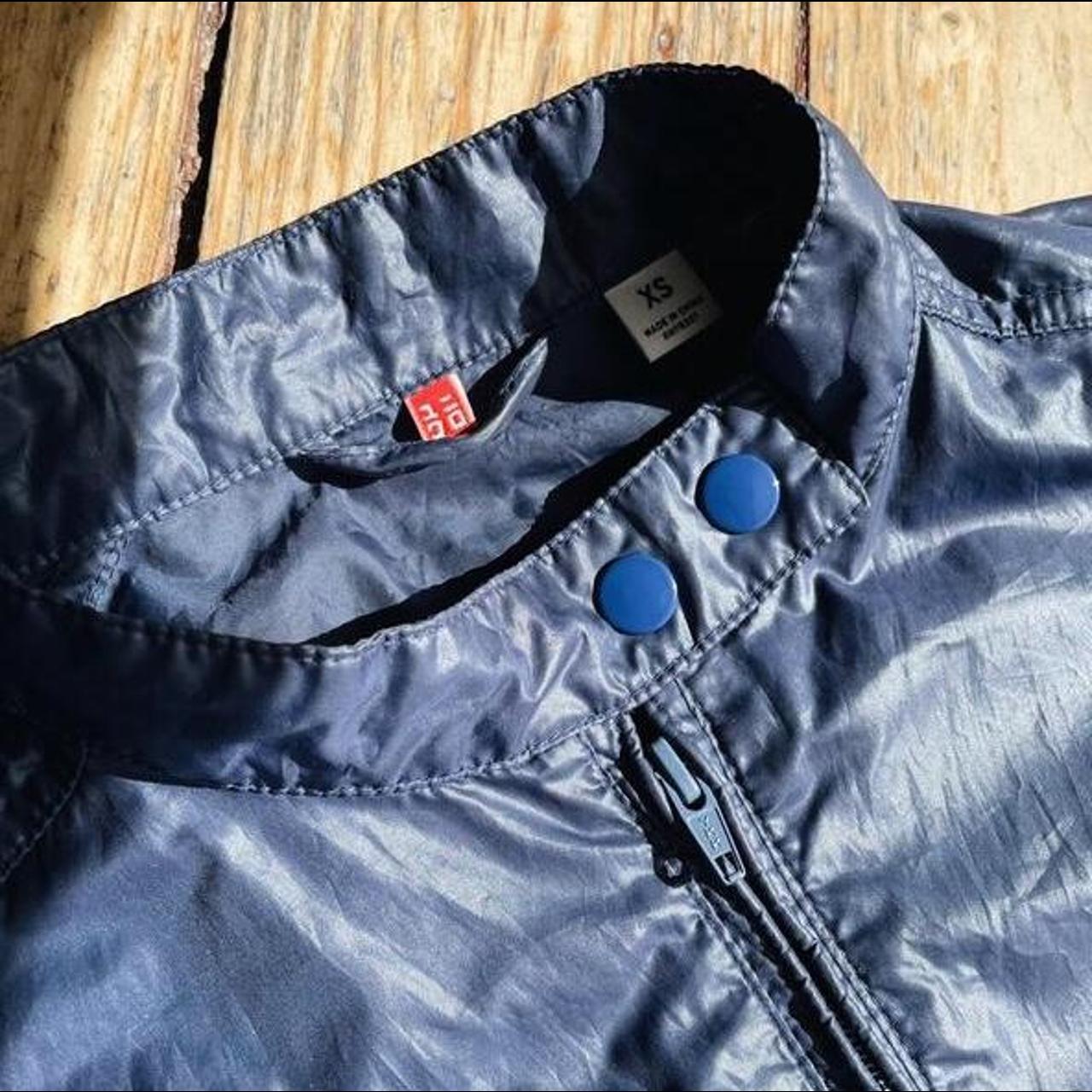 Sportswear uniqlo waterproof rain jacket with stand... Depop