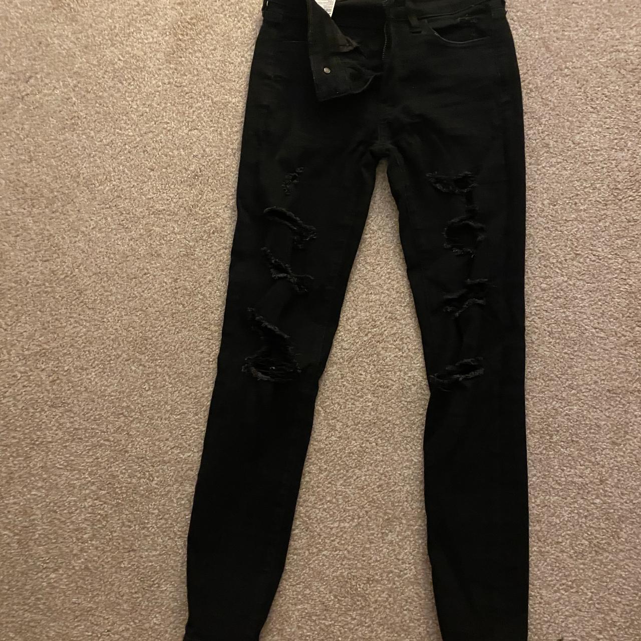 Black ripped jeans. American Eagle Size seen in 2nd... Depop
