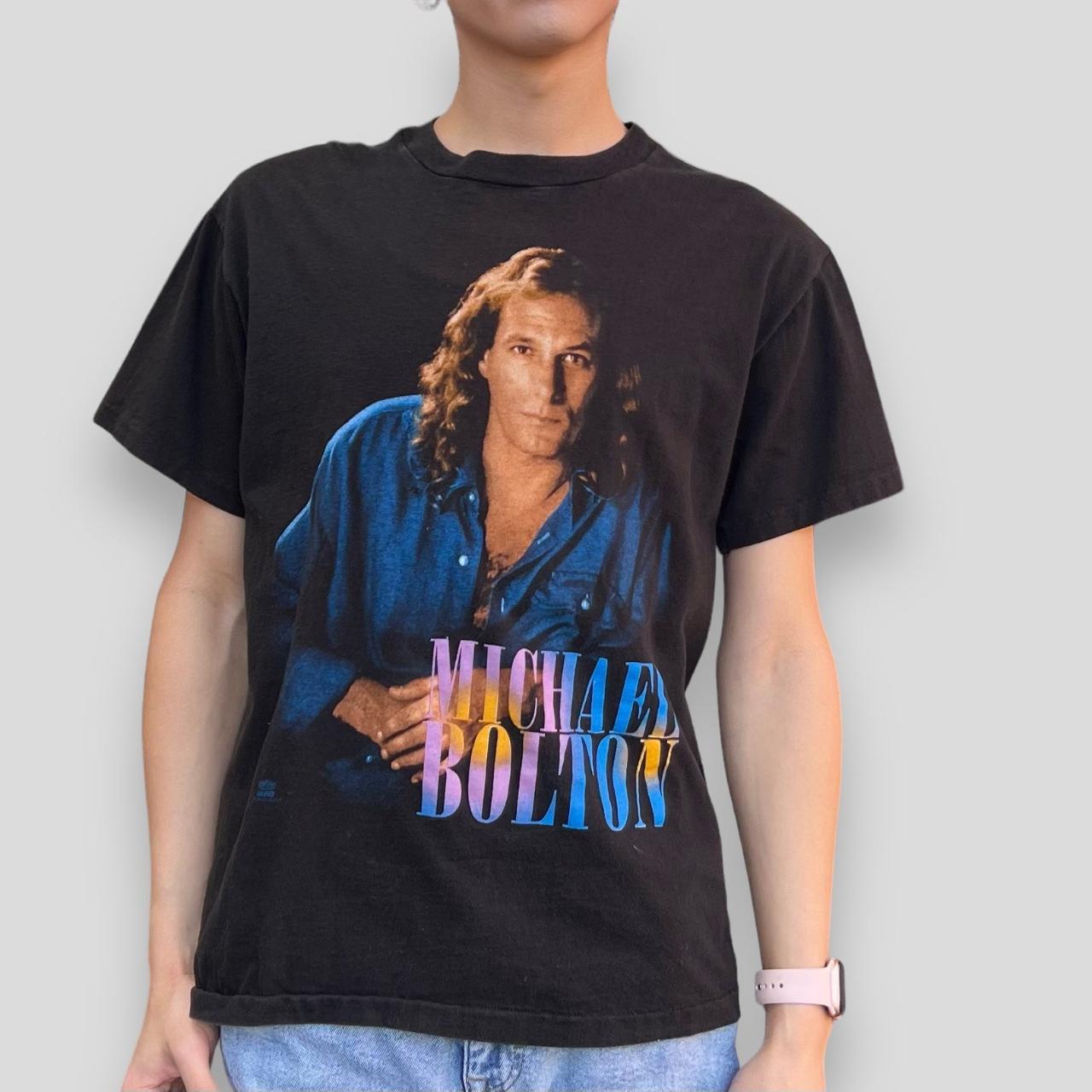 Michael selling Bolton 1994 World Tour T Shirt