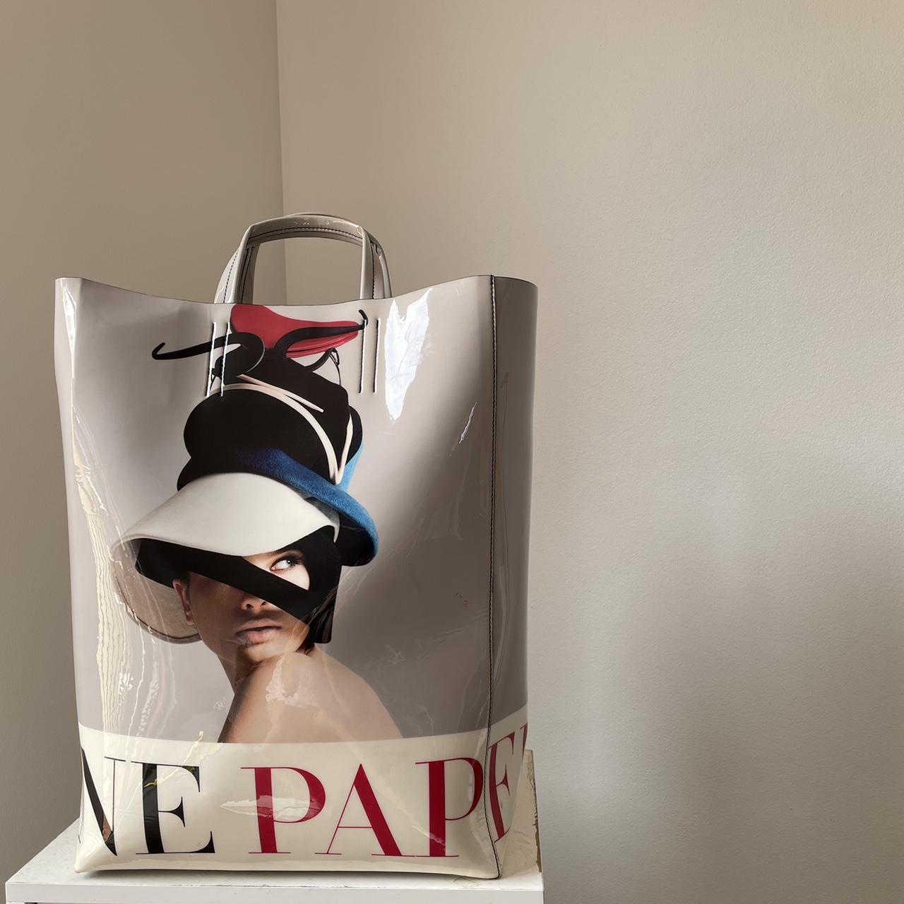 Acne Studios Baker PVC tote. Looking to its...