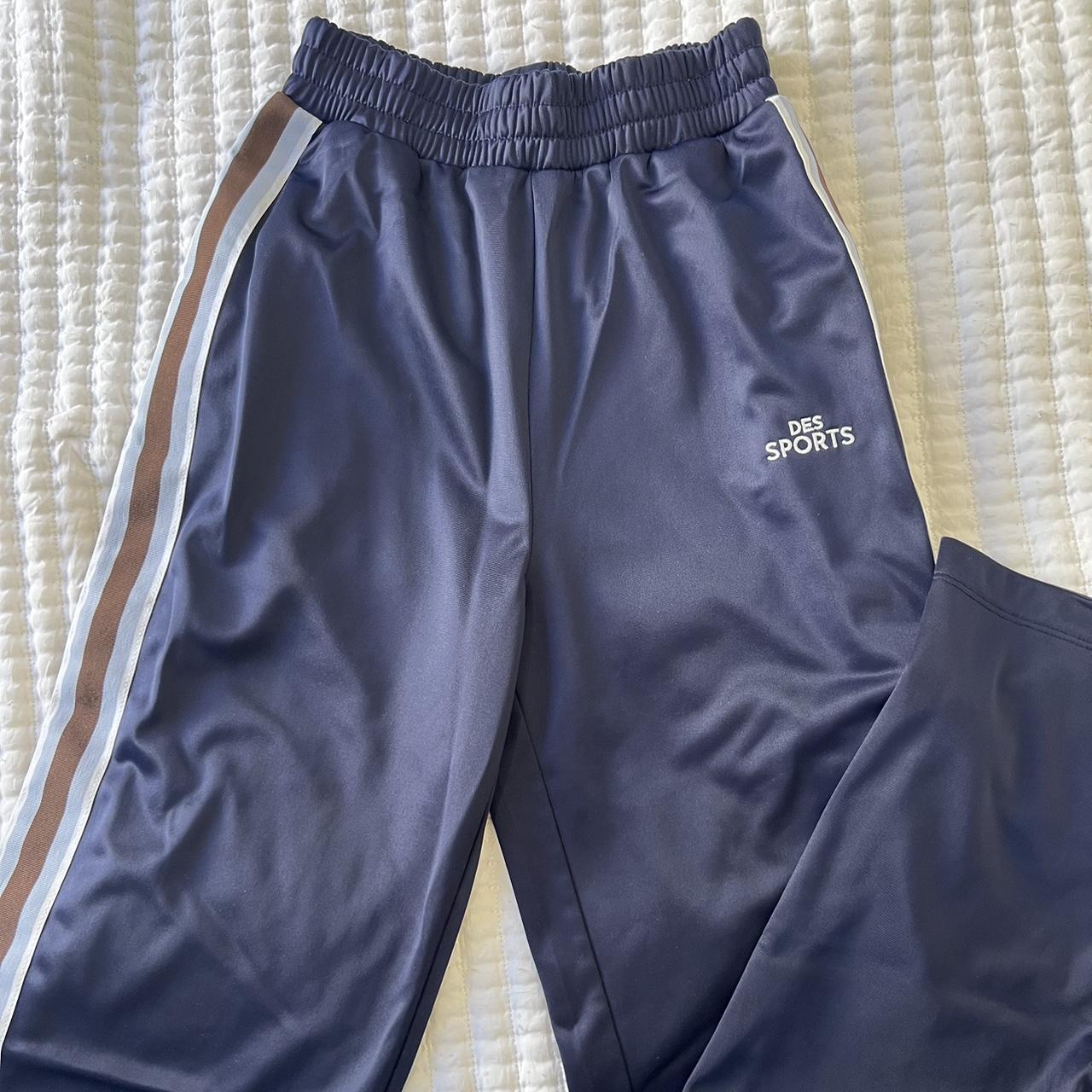 Navy blue track pants, only worn a few times size 2/4 - Depop