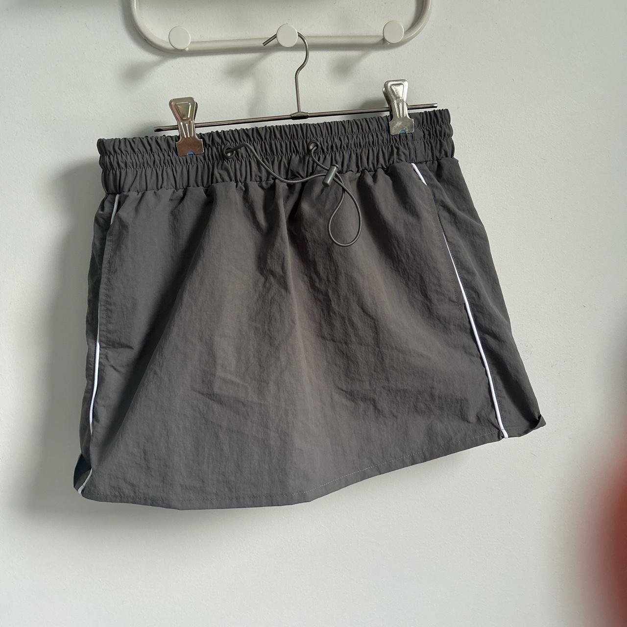 glassons track mini skirt size 8 could fit a 10... - Depop