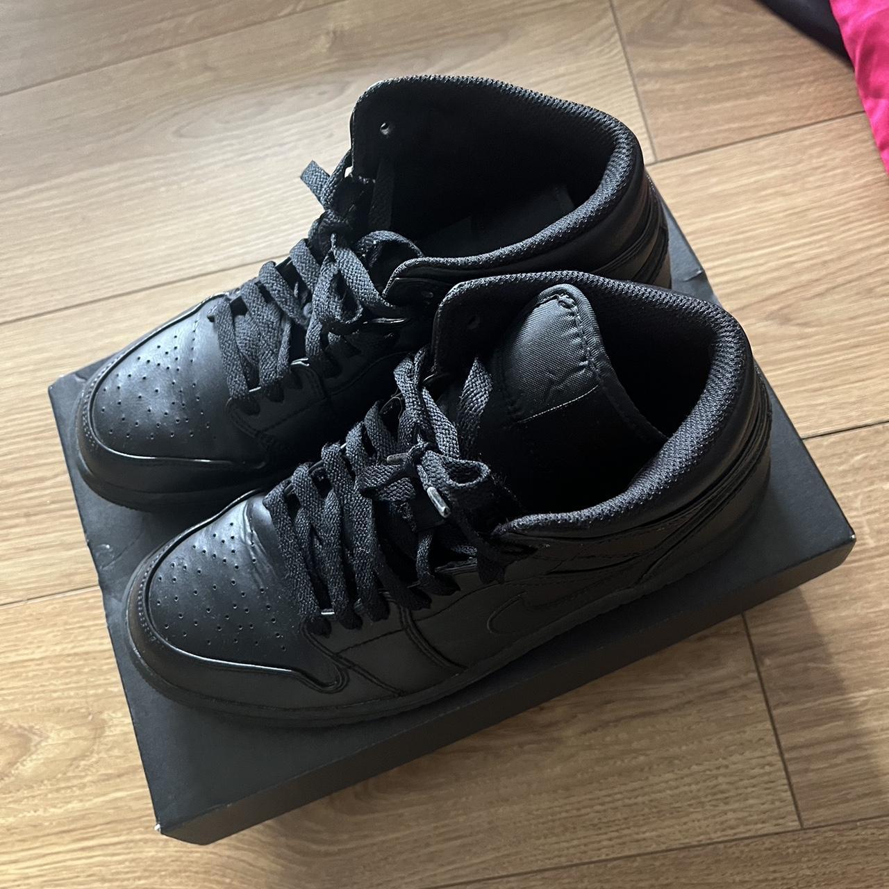 triple black jordans