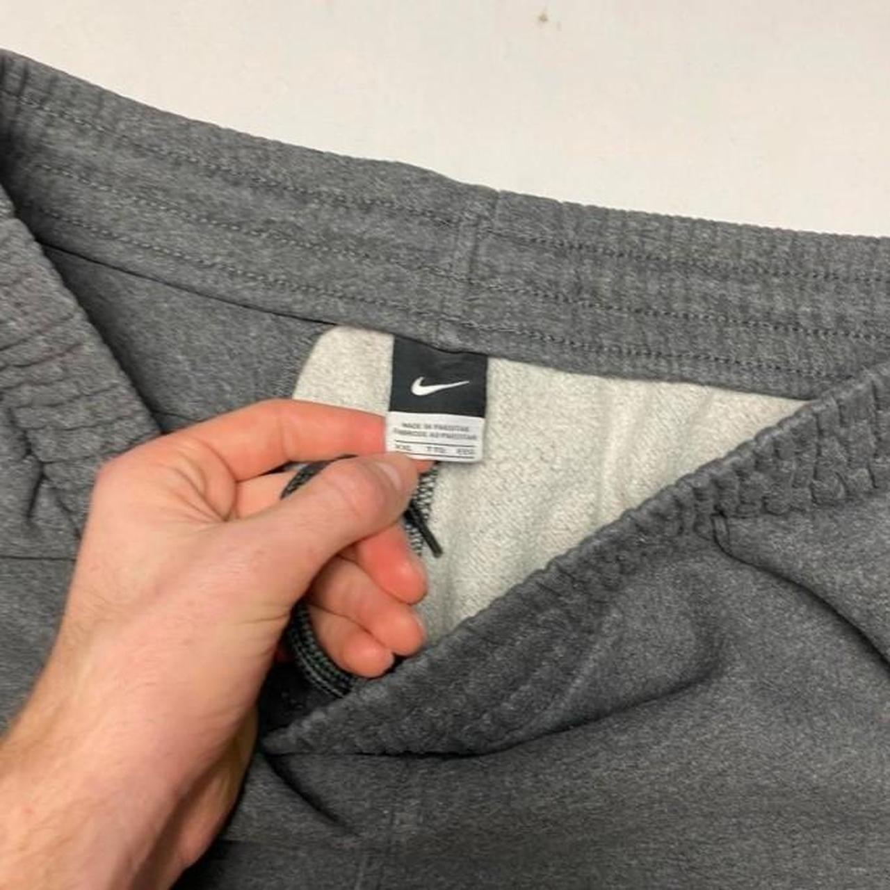 Nike Baggy Fit Joggers Dark Grey with swoosh to... Depop