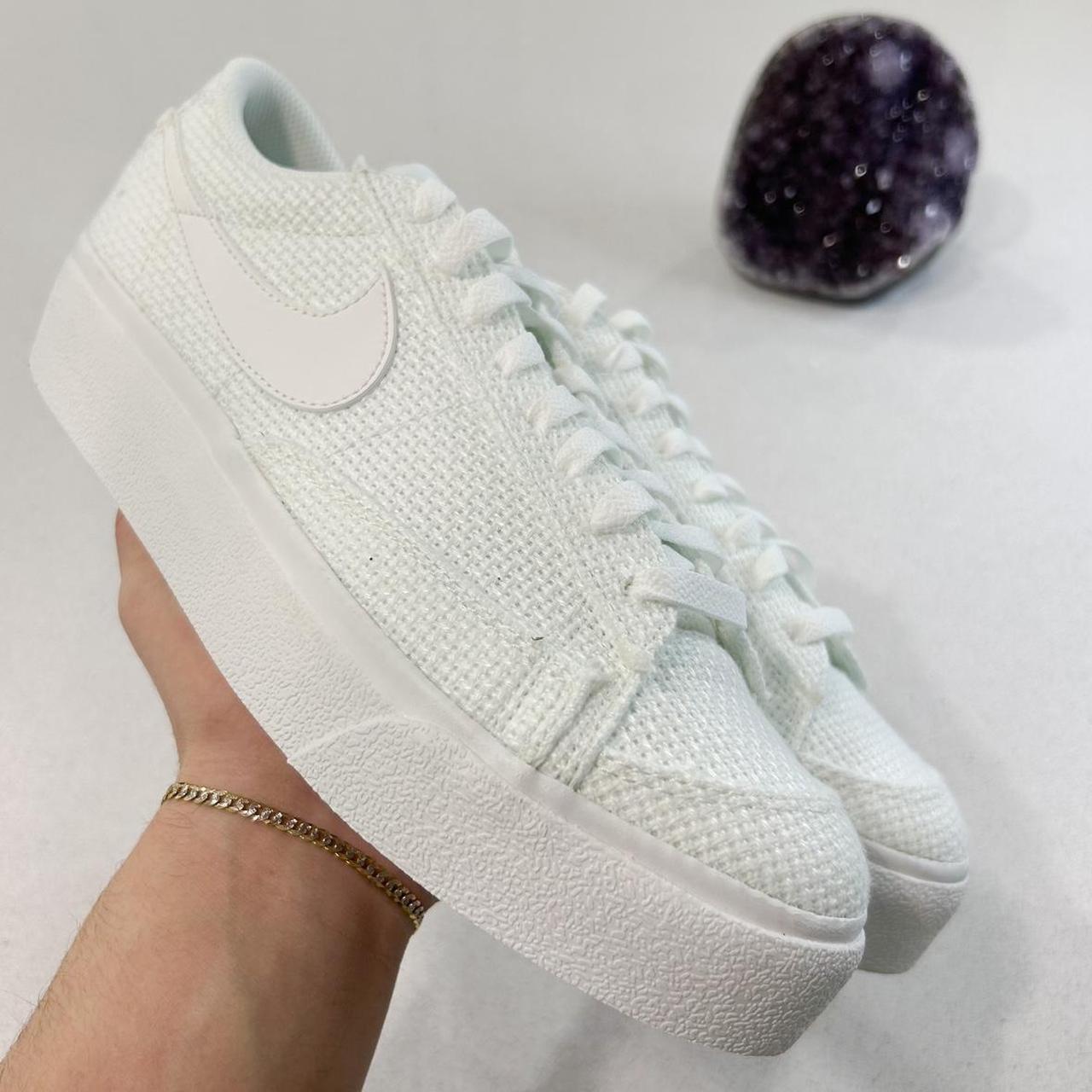 nike blazer low x trainers in cream and red
