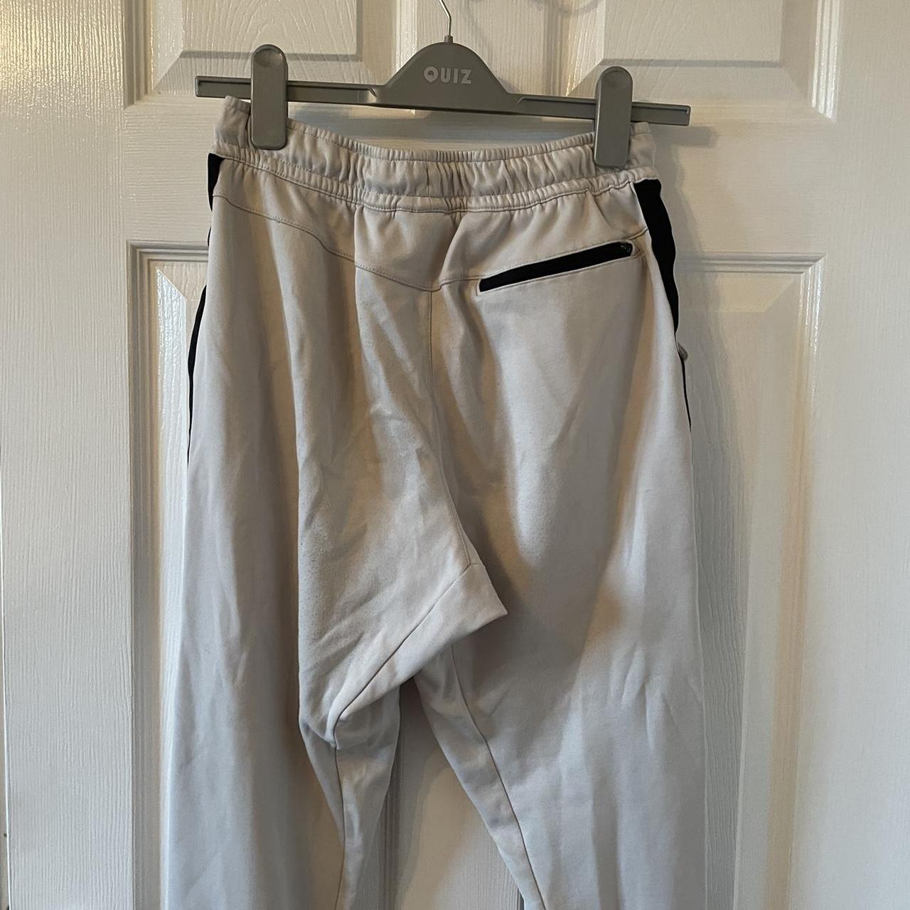 Grey Nike joggers Slight bubbling on top back shown... Depop