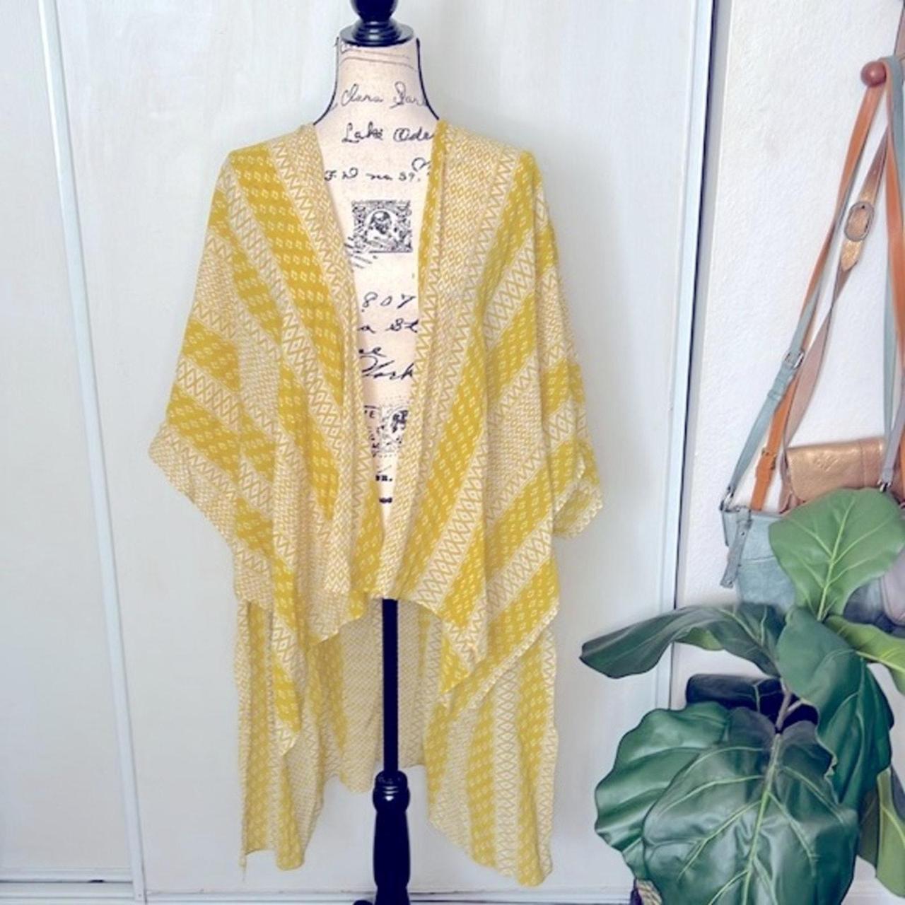 BCBG MAXAZRIA Boho Kimono features a high low cut Depop