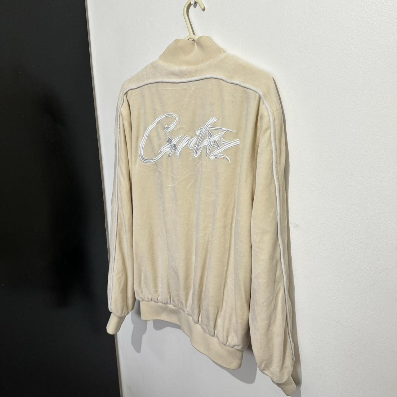 Velour corteiz zip up track top in beige | Depop