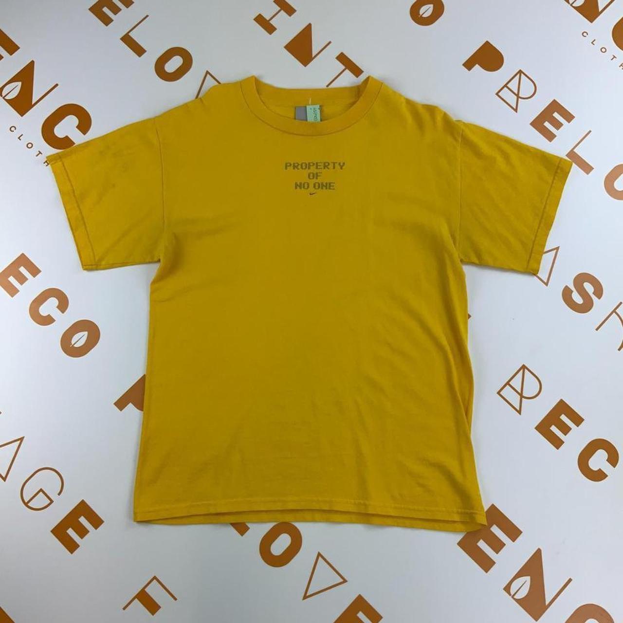 Nike yellow crew neck t shirt with spell out of... - Depop