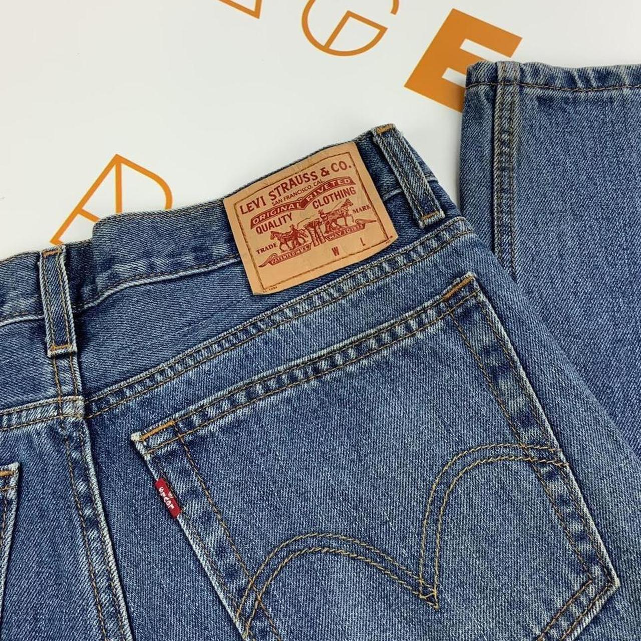 Levi's blue men's denim jeans with famous logo on... - Depop