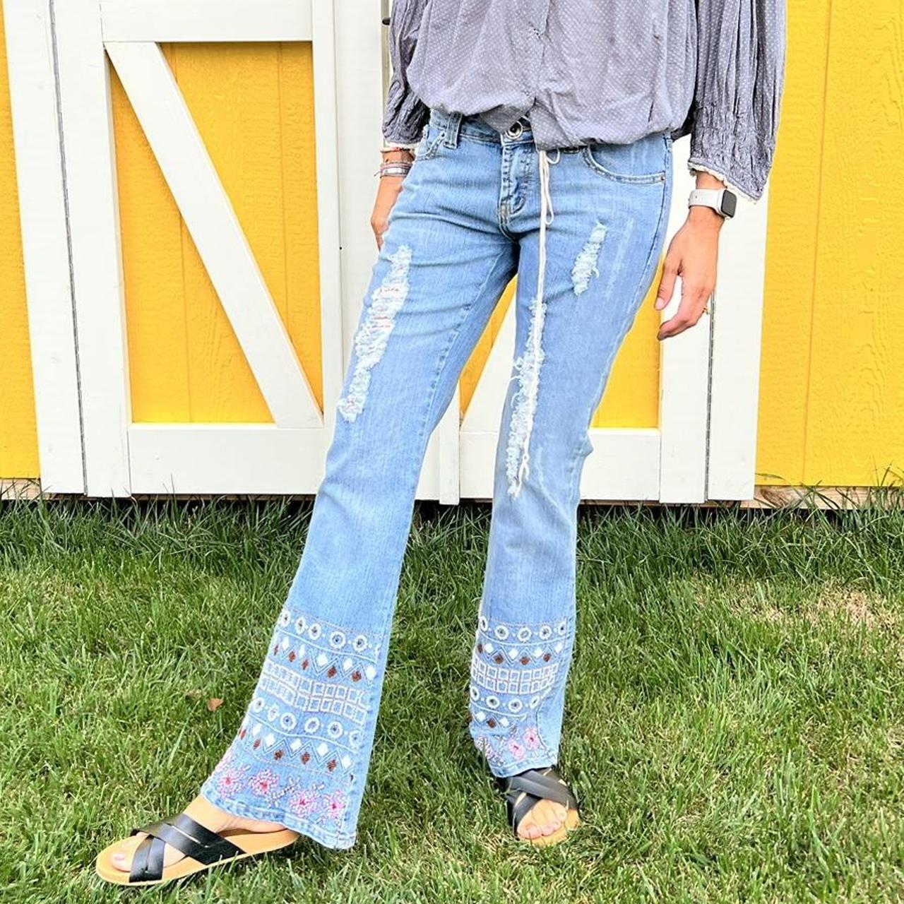 Blue jeans with fringe 2024 bottom