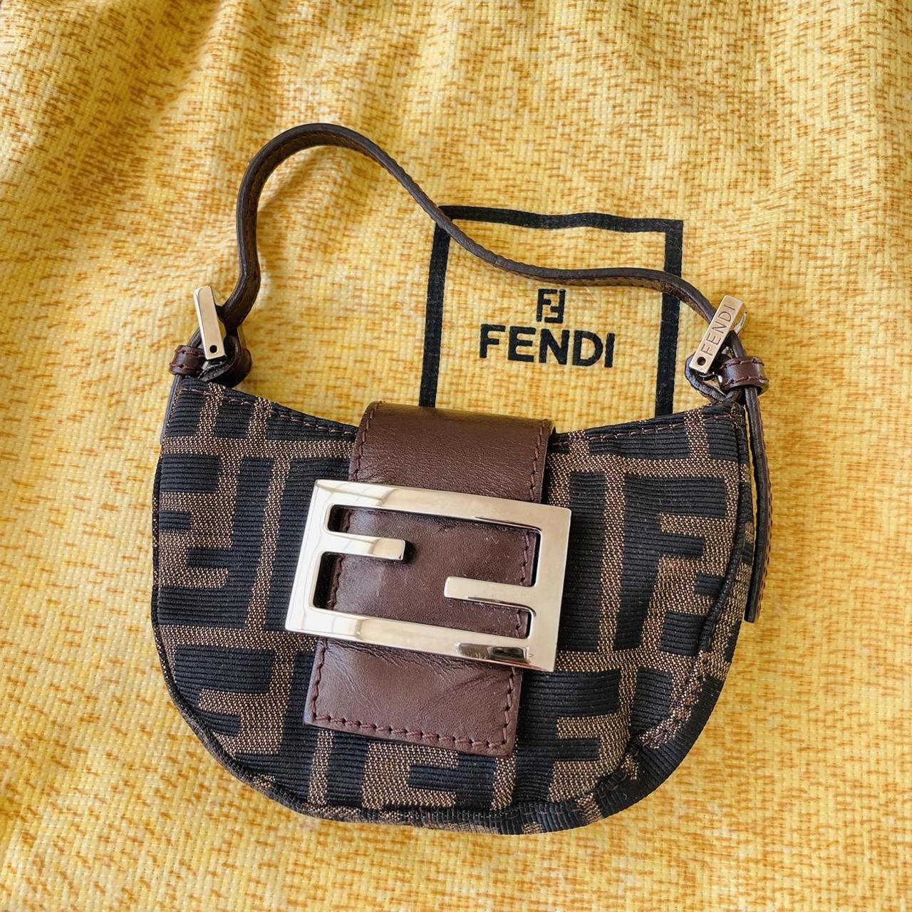 She's a Fendi Leather-Trimmed Zucchino Pochette - Depop