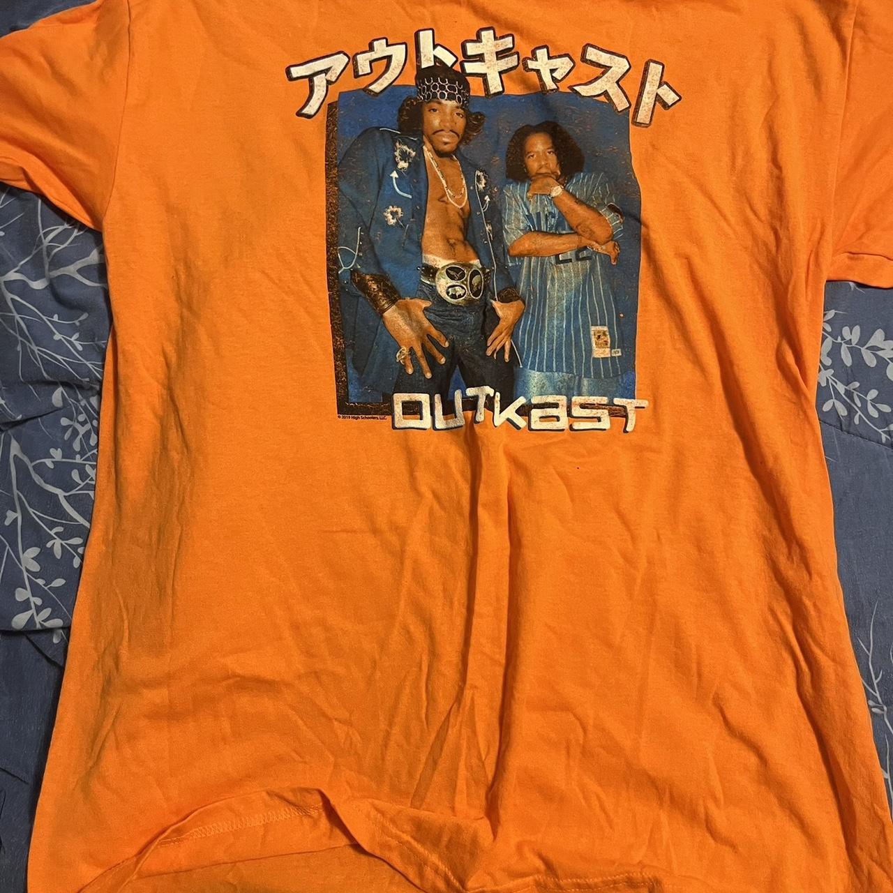 Outkast store orange shirt