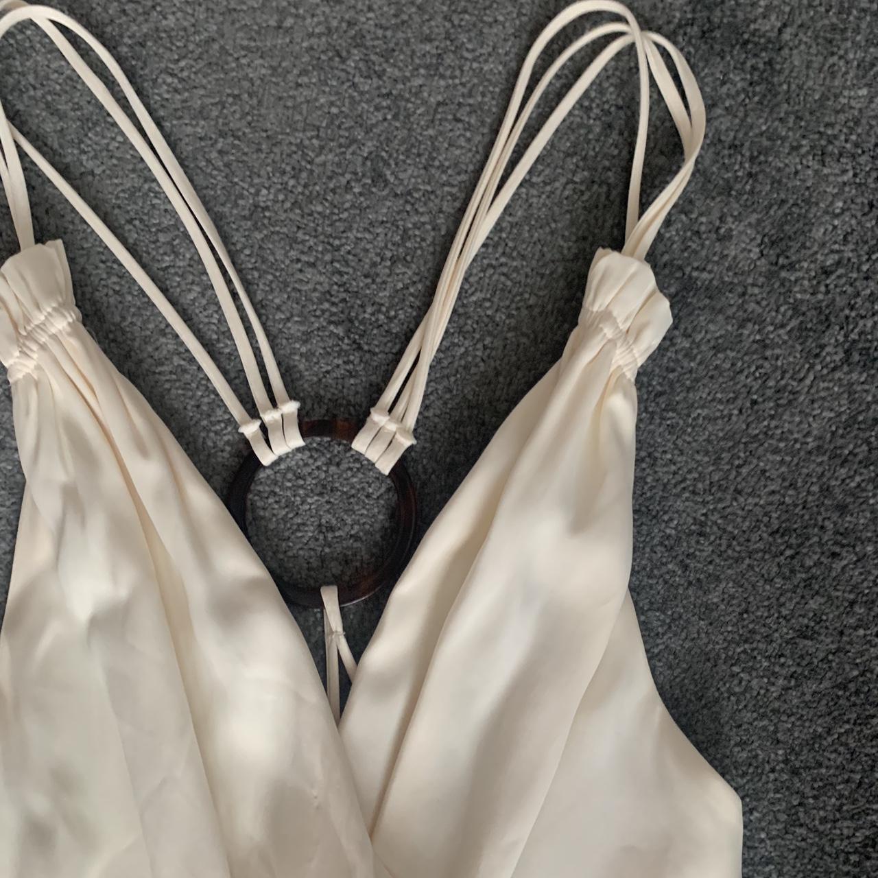 Cream Zara satin jumpsuit size small Plunging... Depop