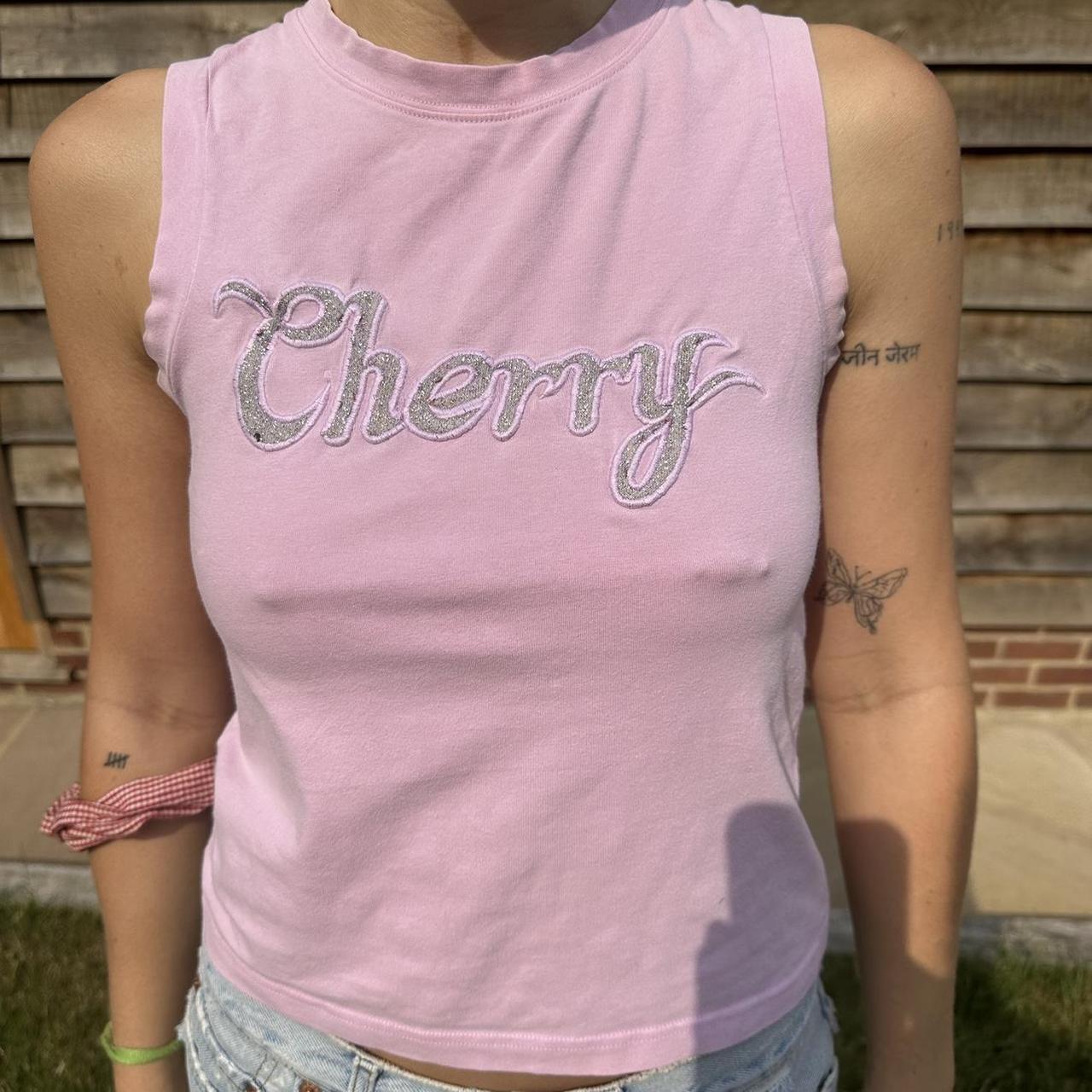 VINTAGE PINK TANK TOP super flattering item worn on... - Depop