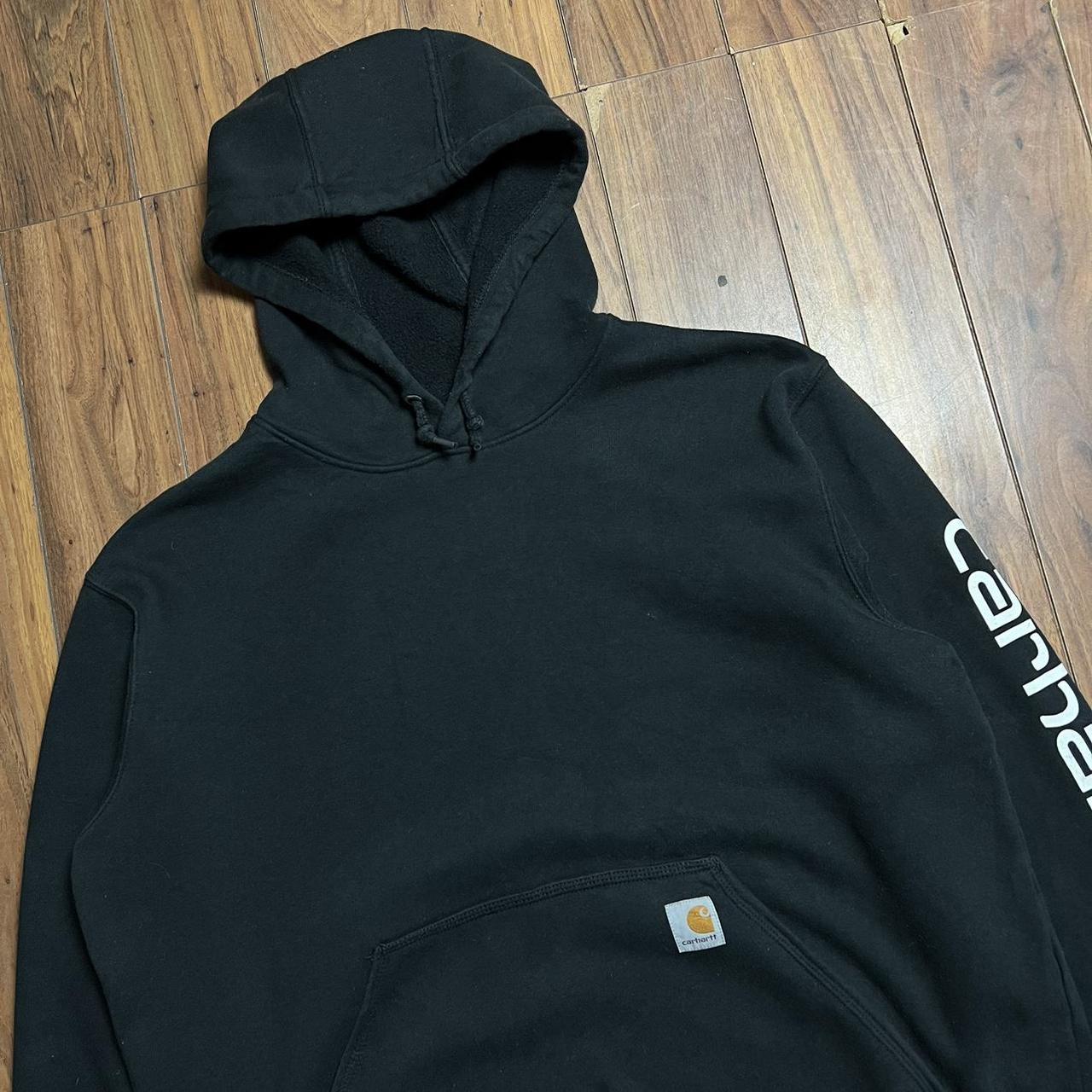 Black Carhartt Hoodie with sleeve spellout print -... - Depop