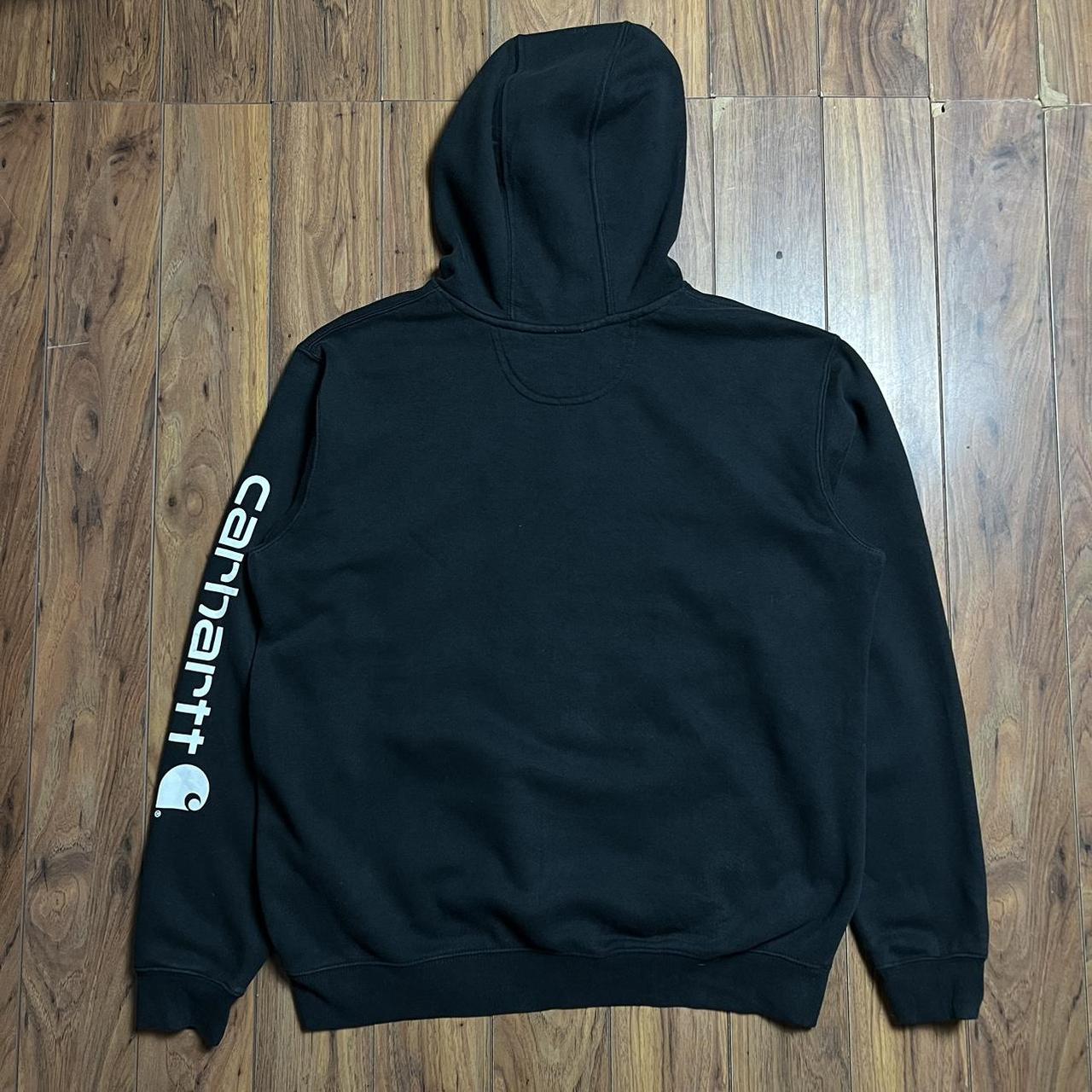 Black Carhartt Hoodie with sleeve spellout print -... - Depop