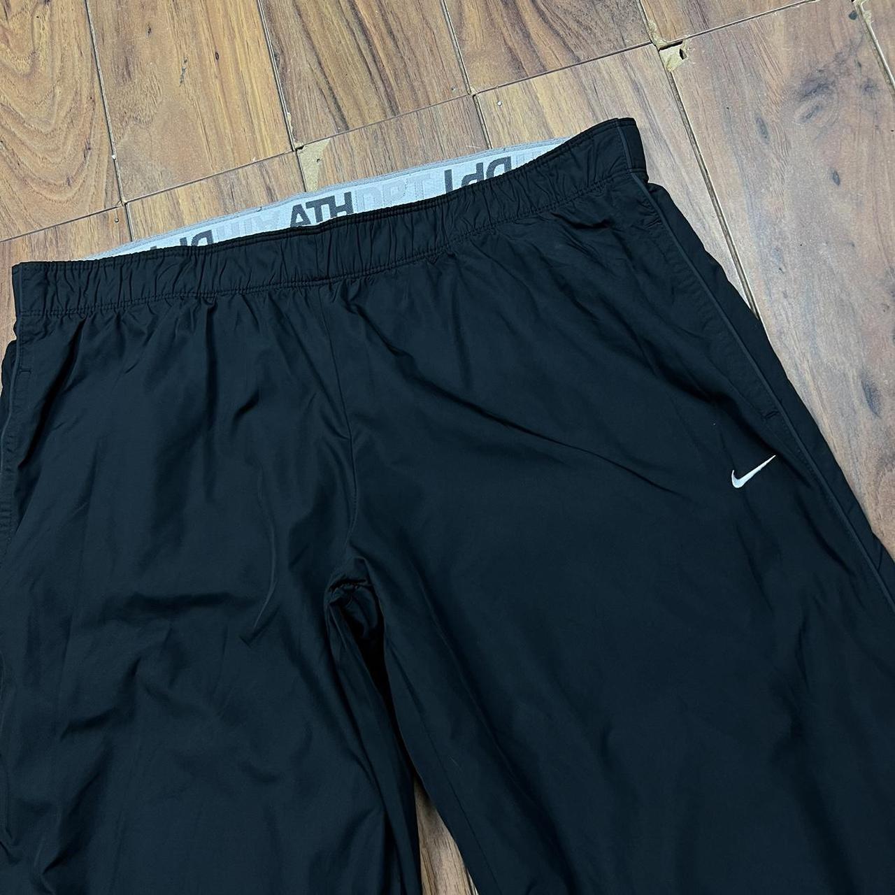 nike short leg tracksuit bottoms