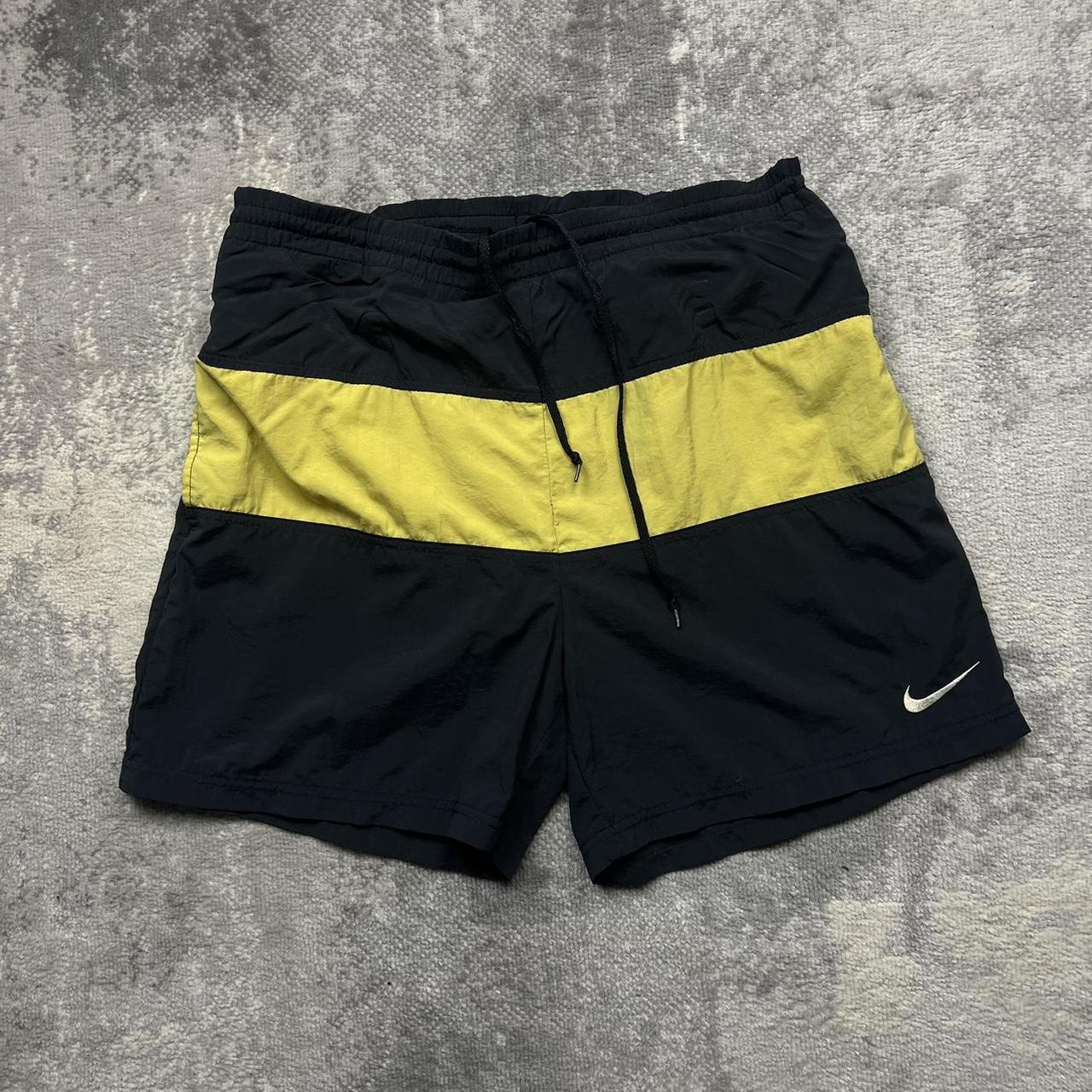 Nike large swoosh shorts yellow on sale