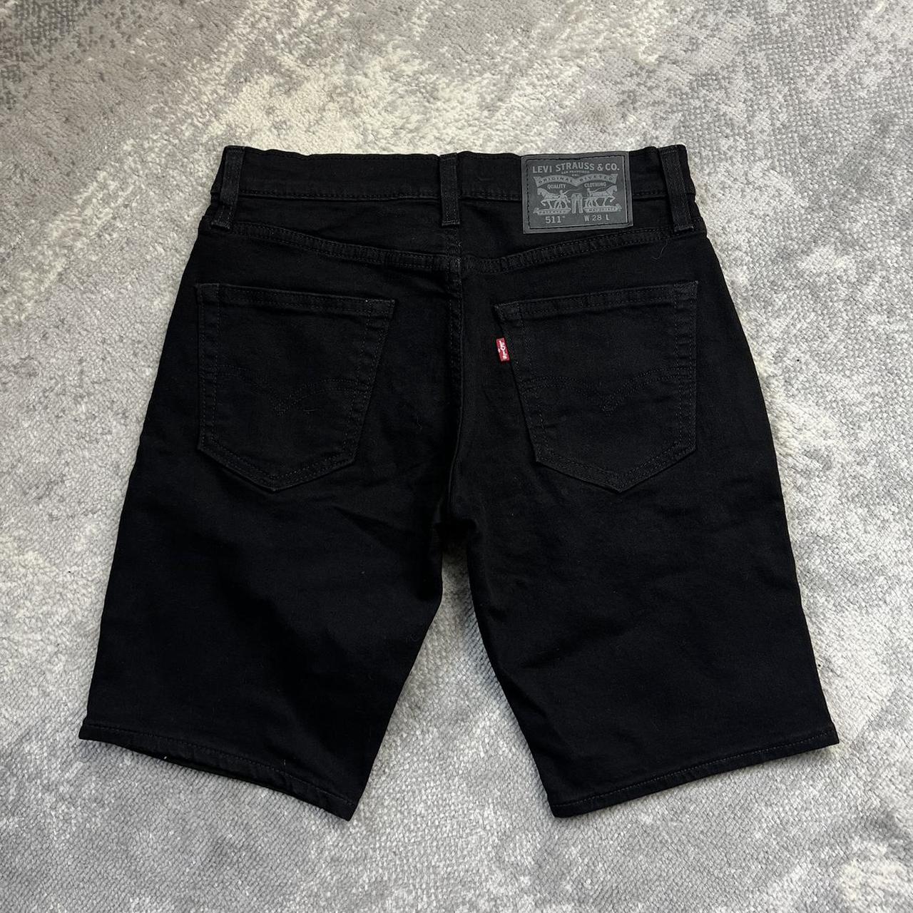 Black levi jean shorts hotsell