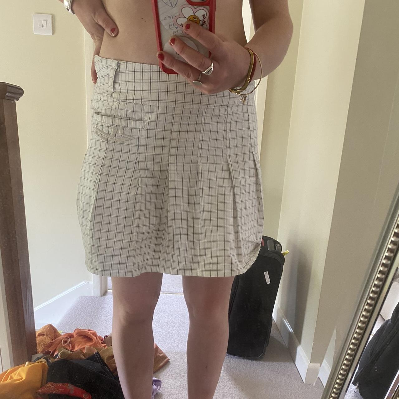 White checkered pleated mini skirt, size 10 - Depop
