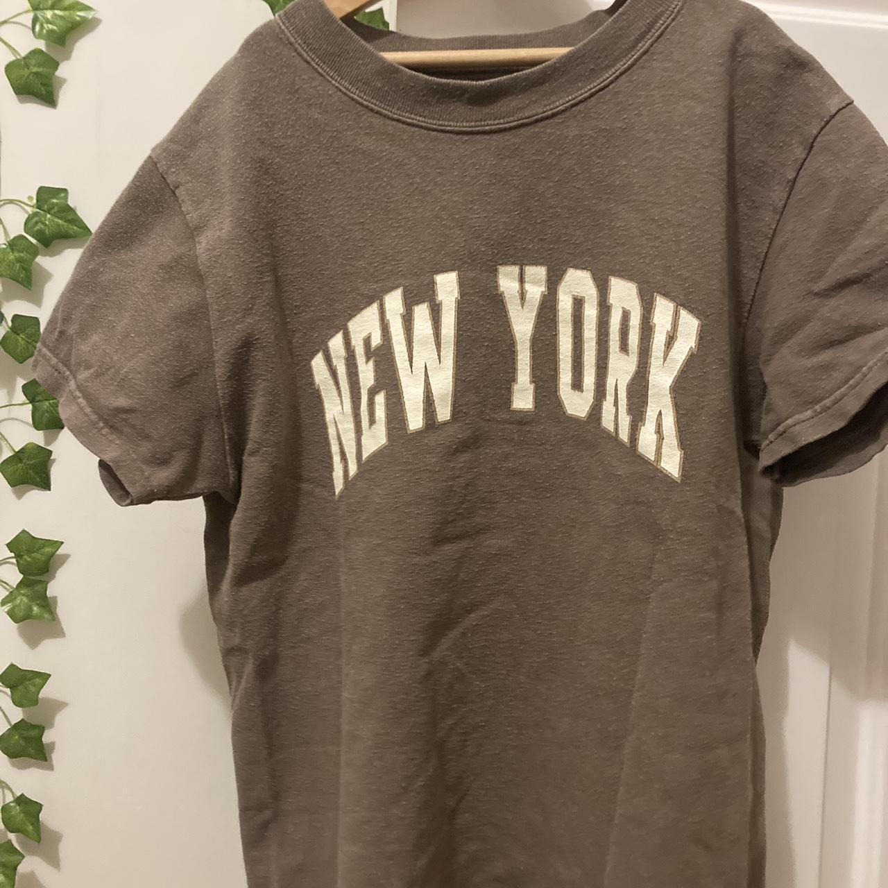 brandy melville brown new york top, worn a lot but... Depop