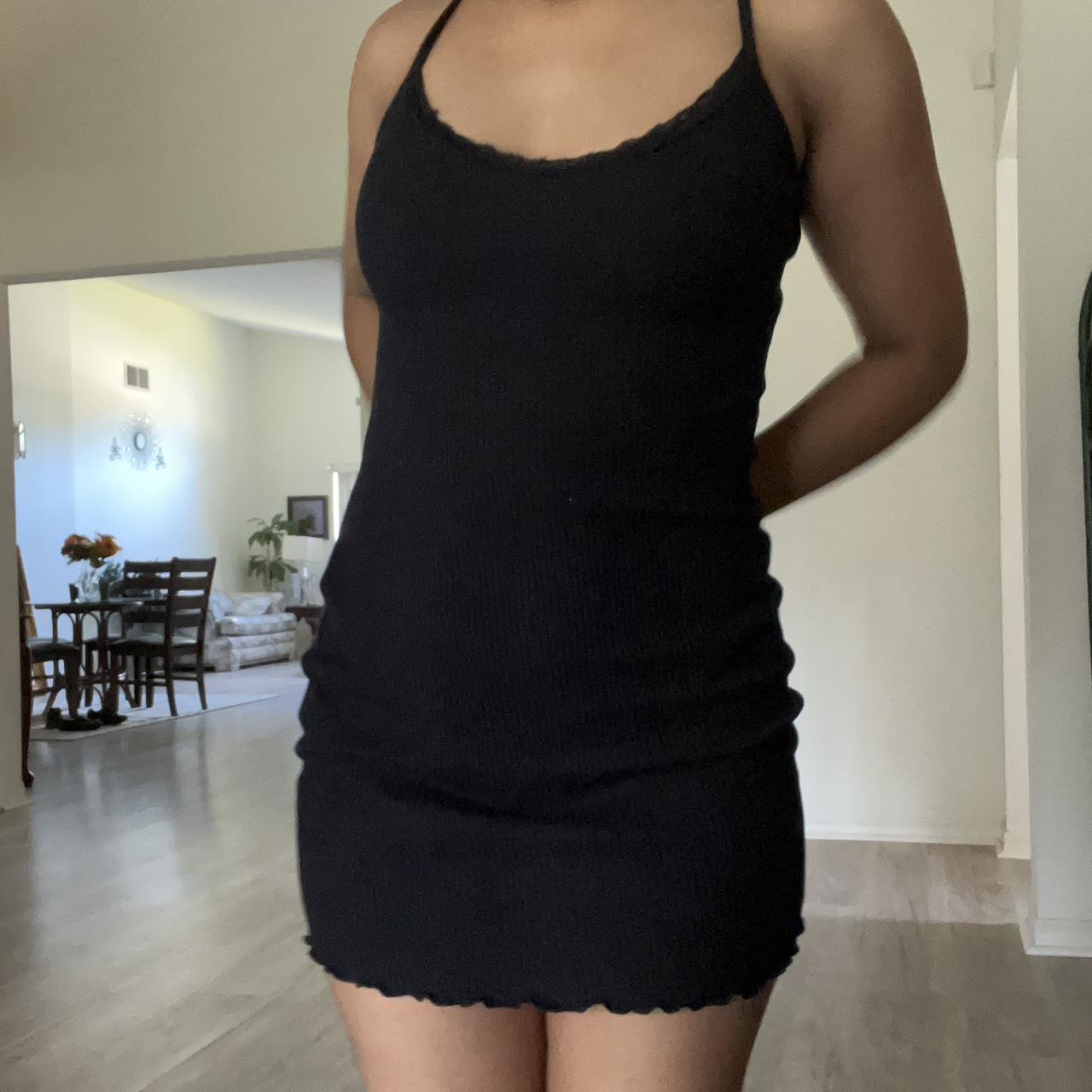 Black mini dress with lace trim at the neckline - Depop