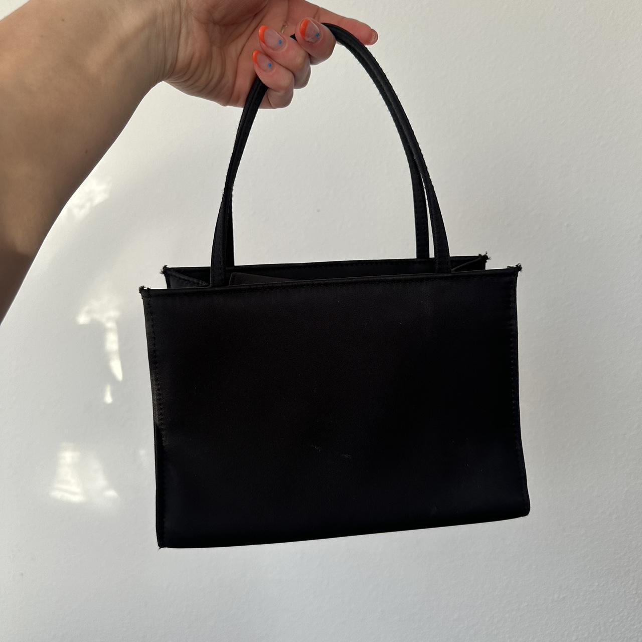 Mini structured 90 s bag with red lining inside. Depop